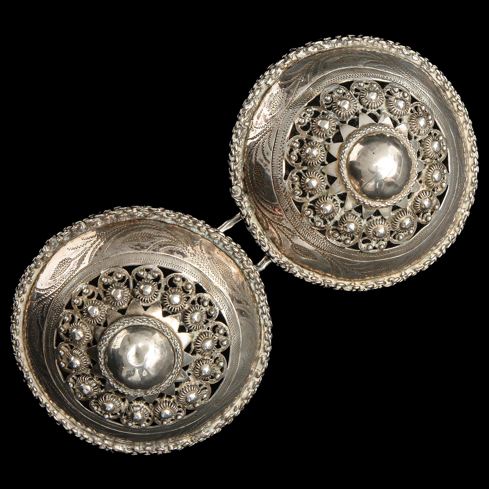 A Pair of Silver Broekstukken: silver Zeeland breeches, diameter 8 cm.