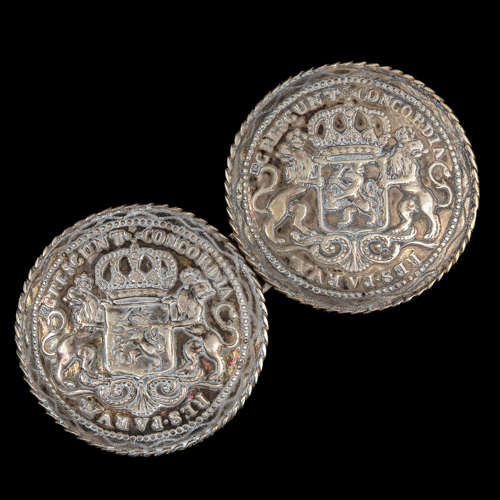 A Pair of Silver Broekstukken: silver Zeeland breeches, diameter 7 cm.