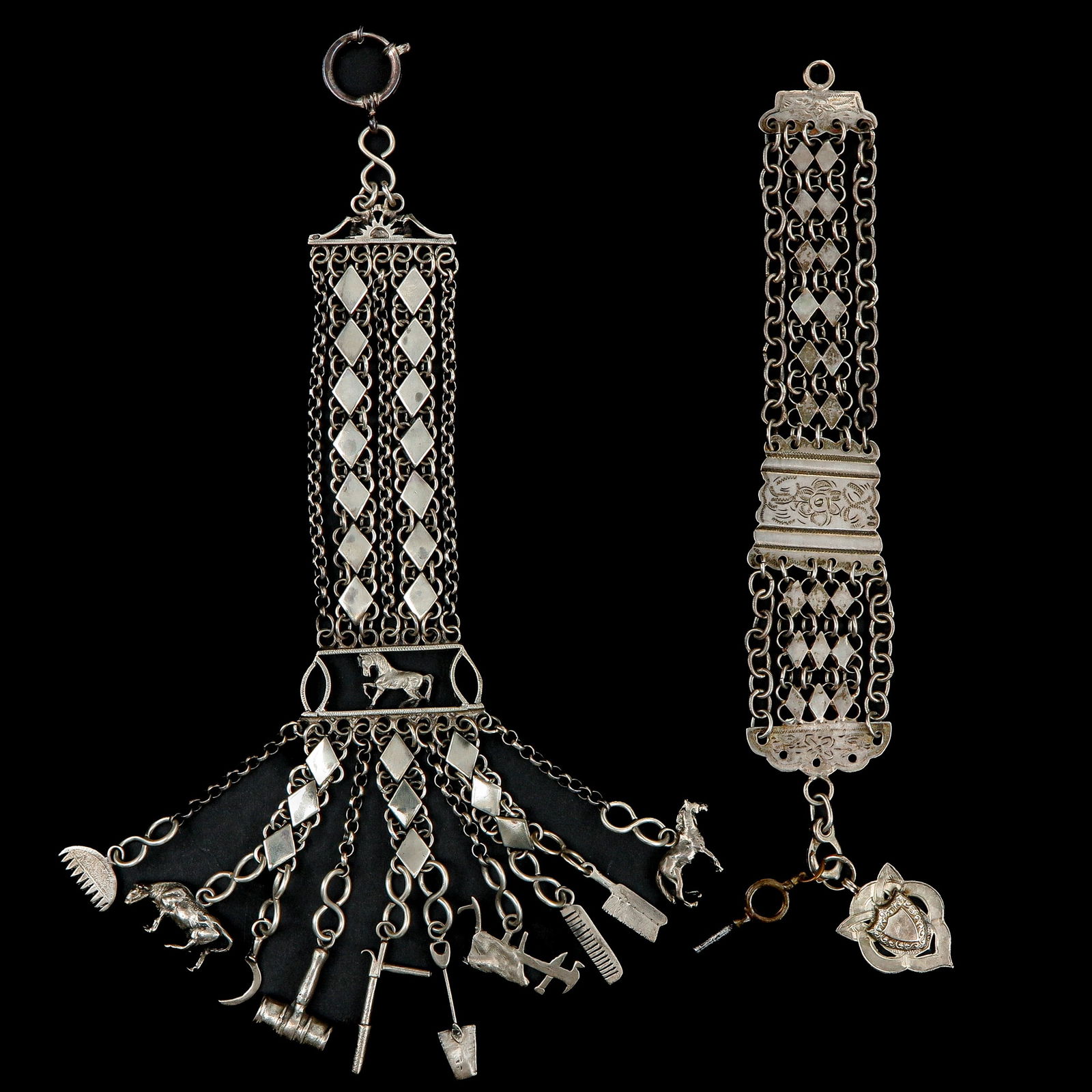 A Lot of Two Chatelaines: consisting of two chatelaines with many attributes, including broom and shovel, longest 25 cm.