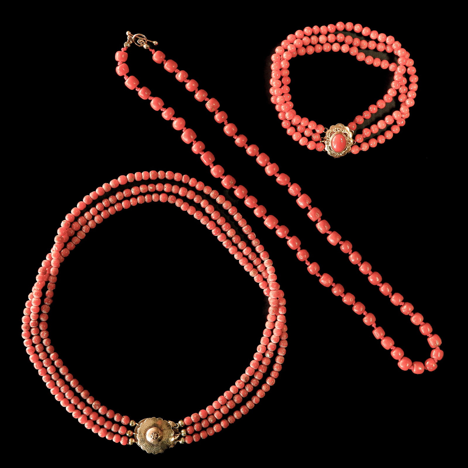 A Lot of 19th Century Red Coral Beads: 19th century, consisting of bracelet and two necklaces, including 14KG clasp