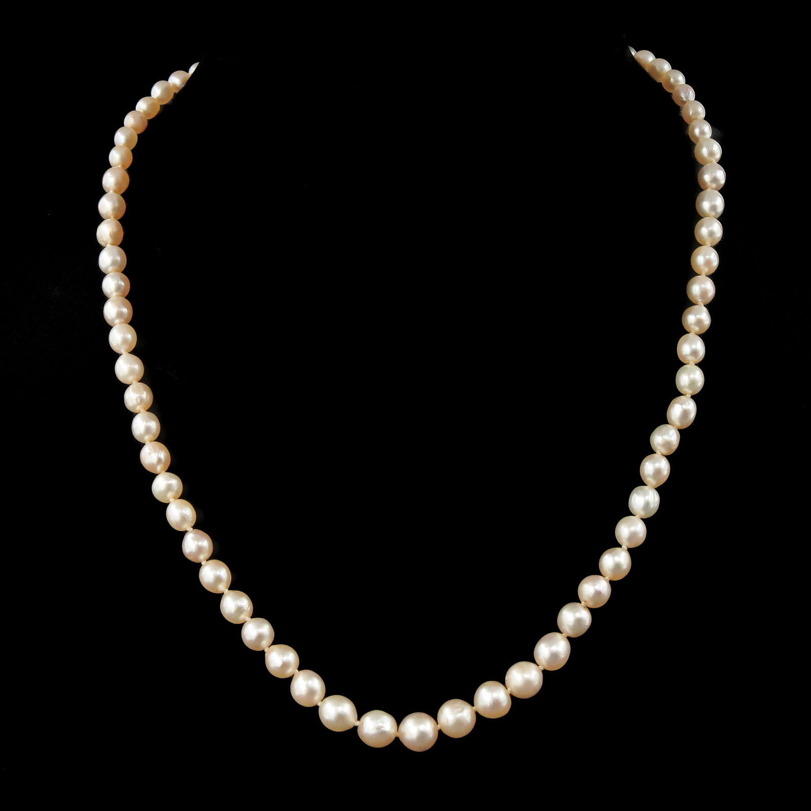 A Pearl Necklace: diameter 4 - 7 mm., 69 pieces, 9KG clasp, purchased in 1938 from jeweler Giebel in Leipzig