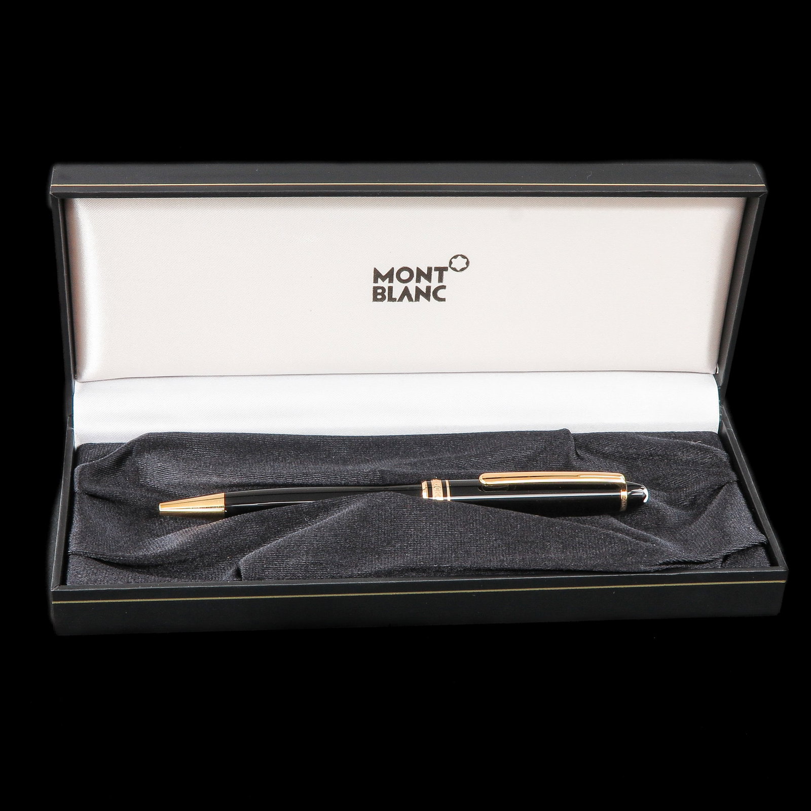 A Montblanc Pen: Montblanc with gold-plated accents, in original box with service guide
