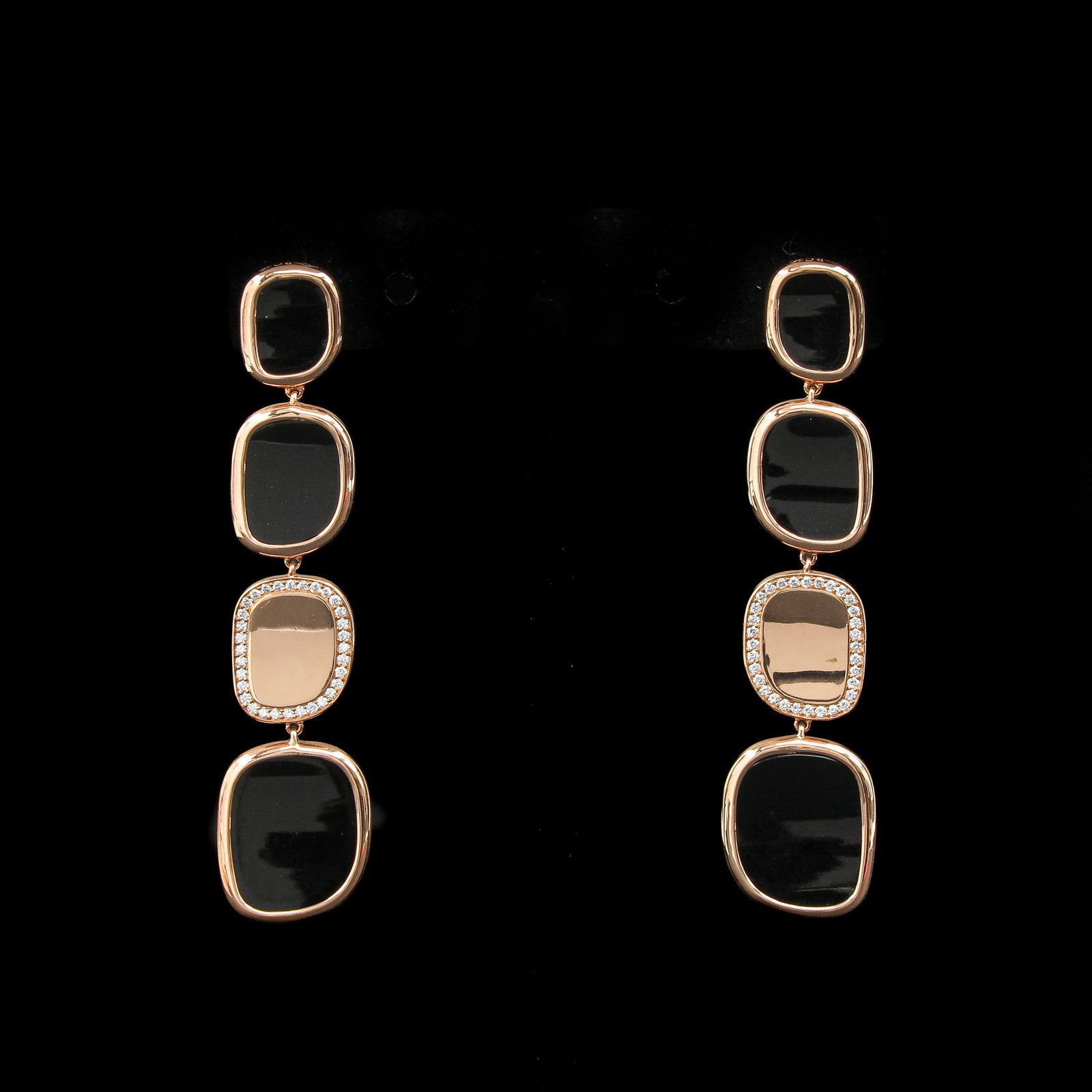 A Pair of 18KG Onyx and Diamond Earrings: set with onyx and diamonds, length 61 mm., retail value € 2,650
