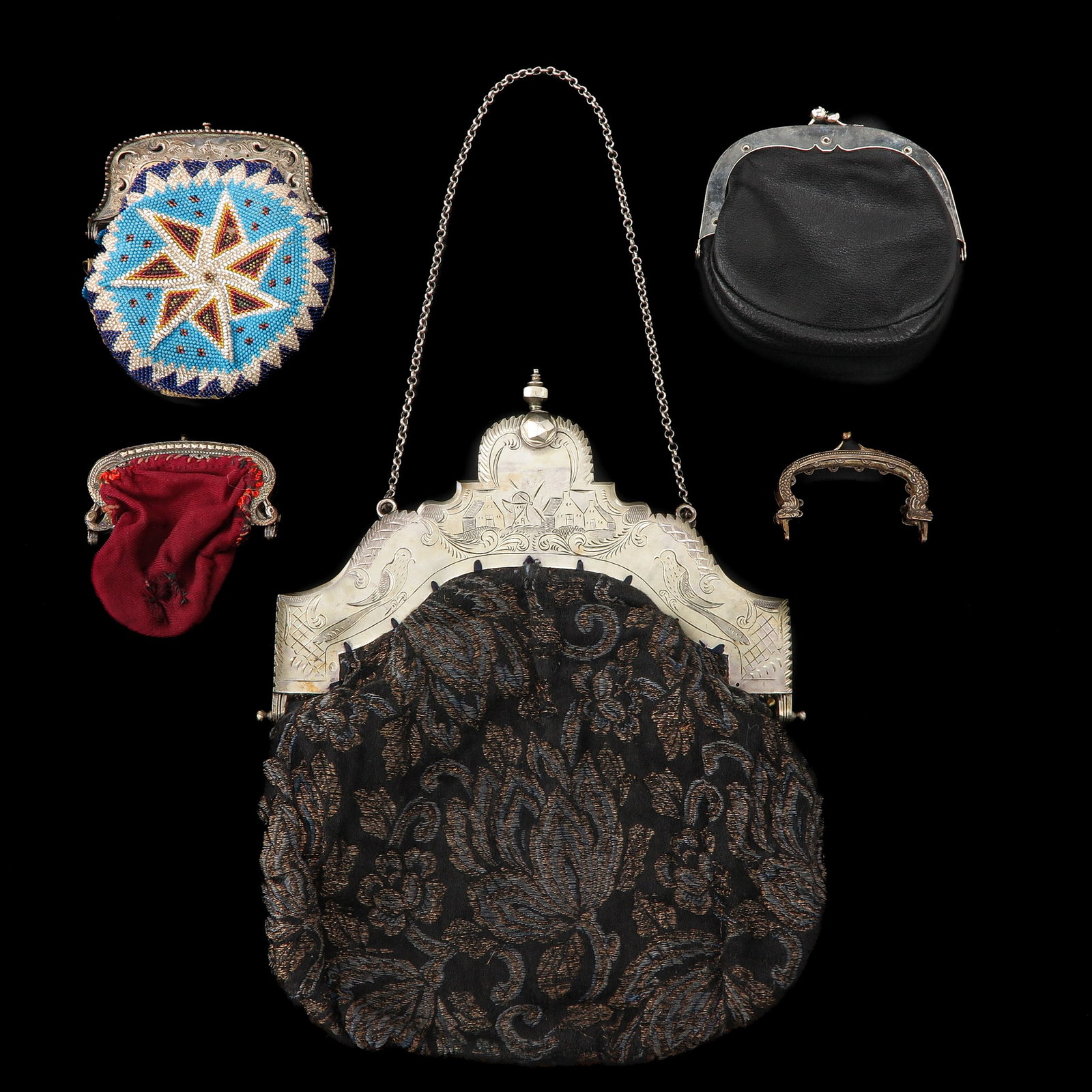 A Group of Purses: purses, incl. 19th century silver parrot bracket, width 20 cm.