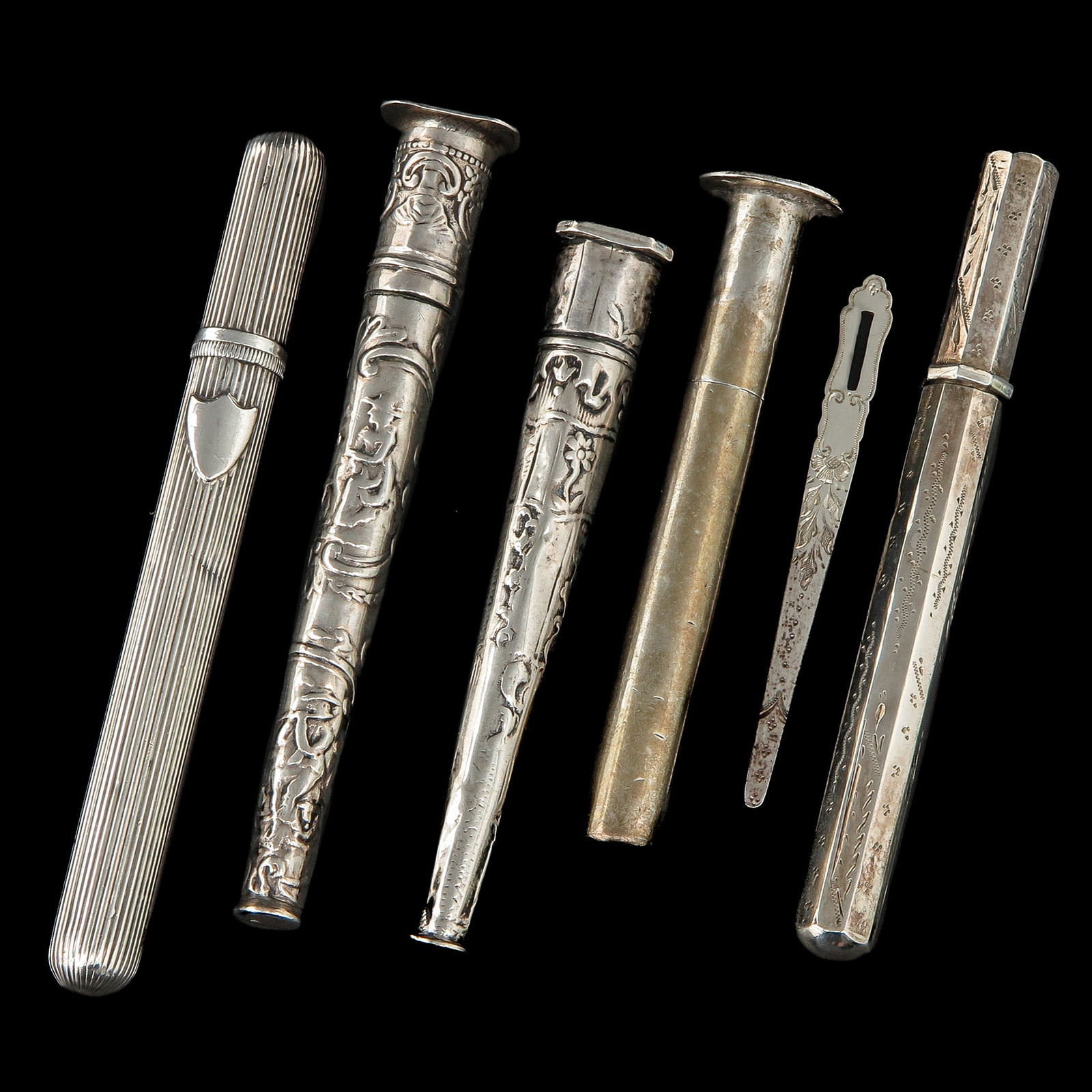 A Group of Silver Needle Cases: consisting of five silver needle cases, incl. 18th century, longest 11 cm.