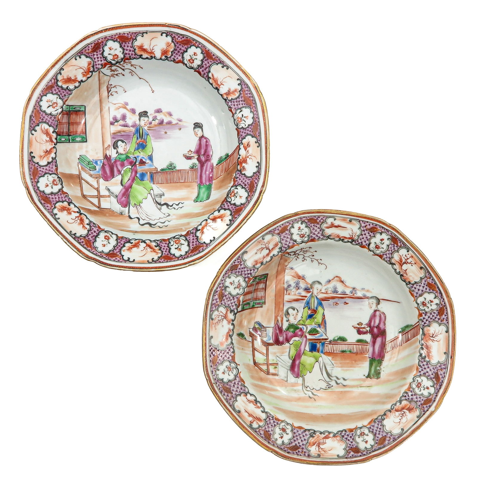 A Pair of Mandarin Decor Plates: Depicting gathering of Chinese figures in a garden, 18th Century, 23 cm. in diameter, in diverse conditions.