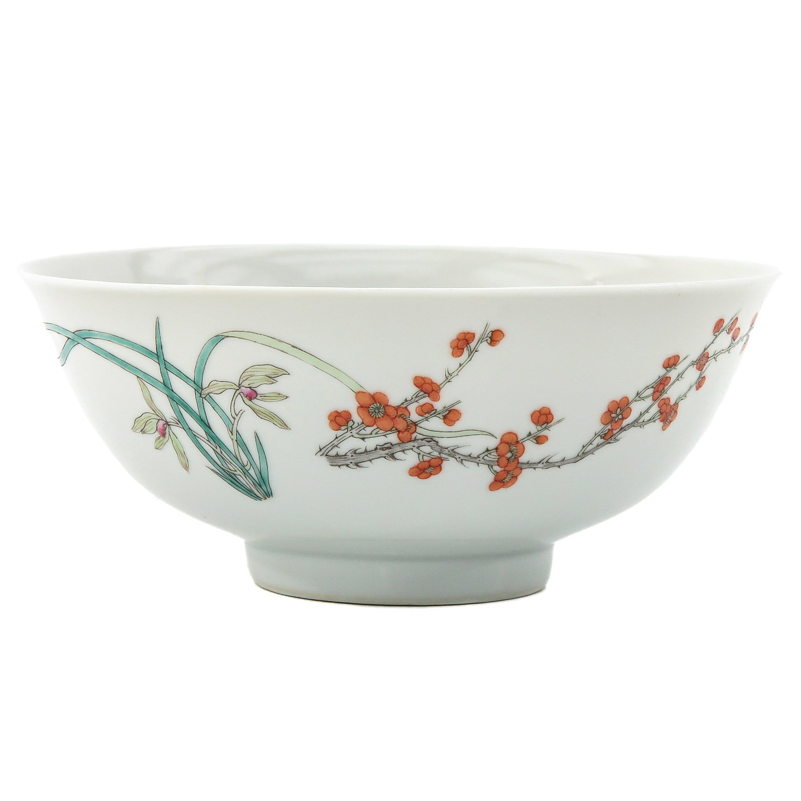 A Famille Rose Bowl: Depicting a scene with flowers and flower blossoms, 18 cm. in diameter.