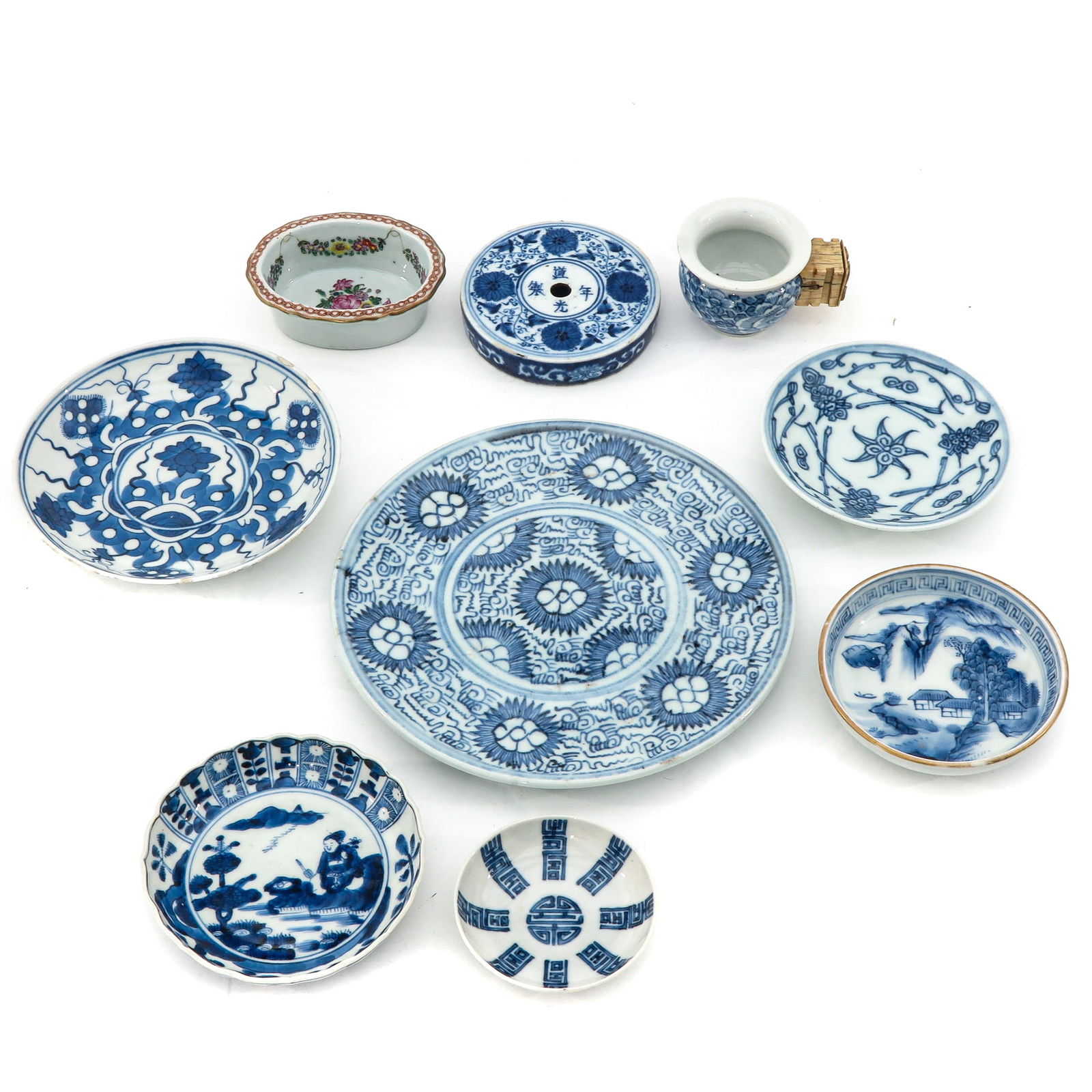 A Collection of Porcelain: 9 pieces, including plates and small trays in a variety of decors and sizes, some 18th Century, largest plate is 19 cm. in diameter, chip and hairline.