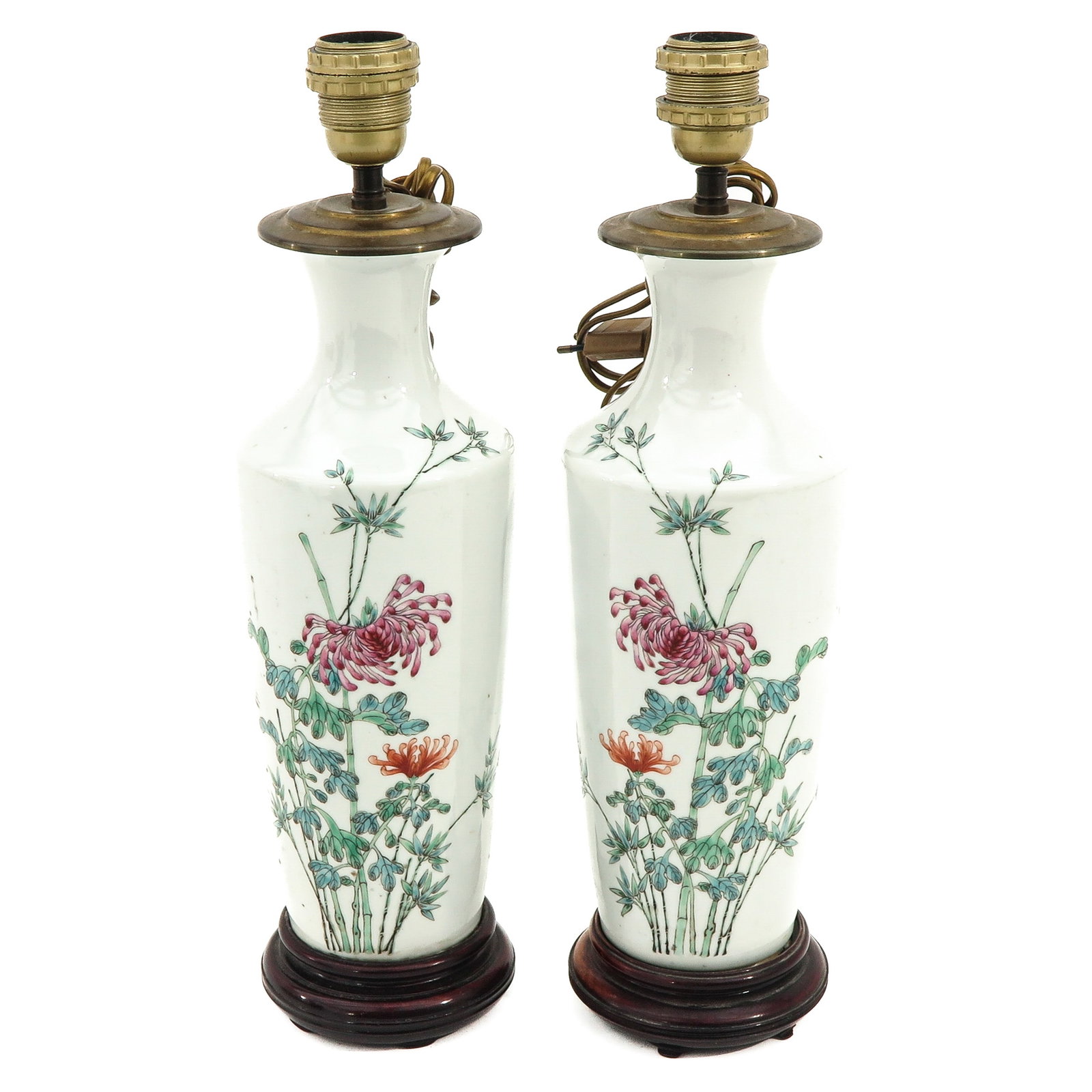 A Pair of Famille Rose Lamps: Decorated with Chrysanthemums and bamboo, on a wood base fitting, 46 cm. tall