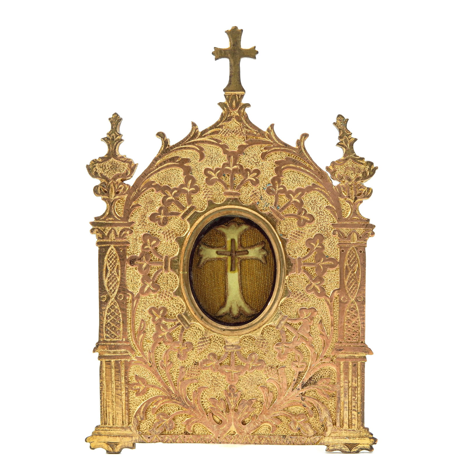 A Kiss Relic: bronze, richly decorated with leaf motifs and Gothic ornamentation, containing relic of the Holy Cross, height 17 cm.
