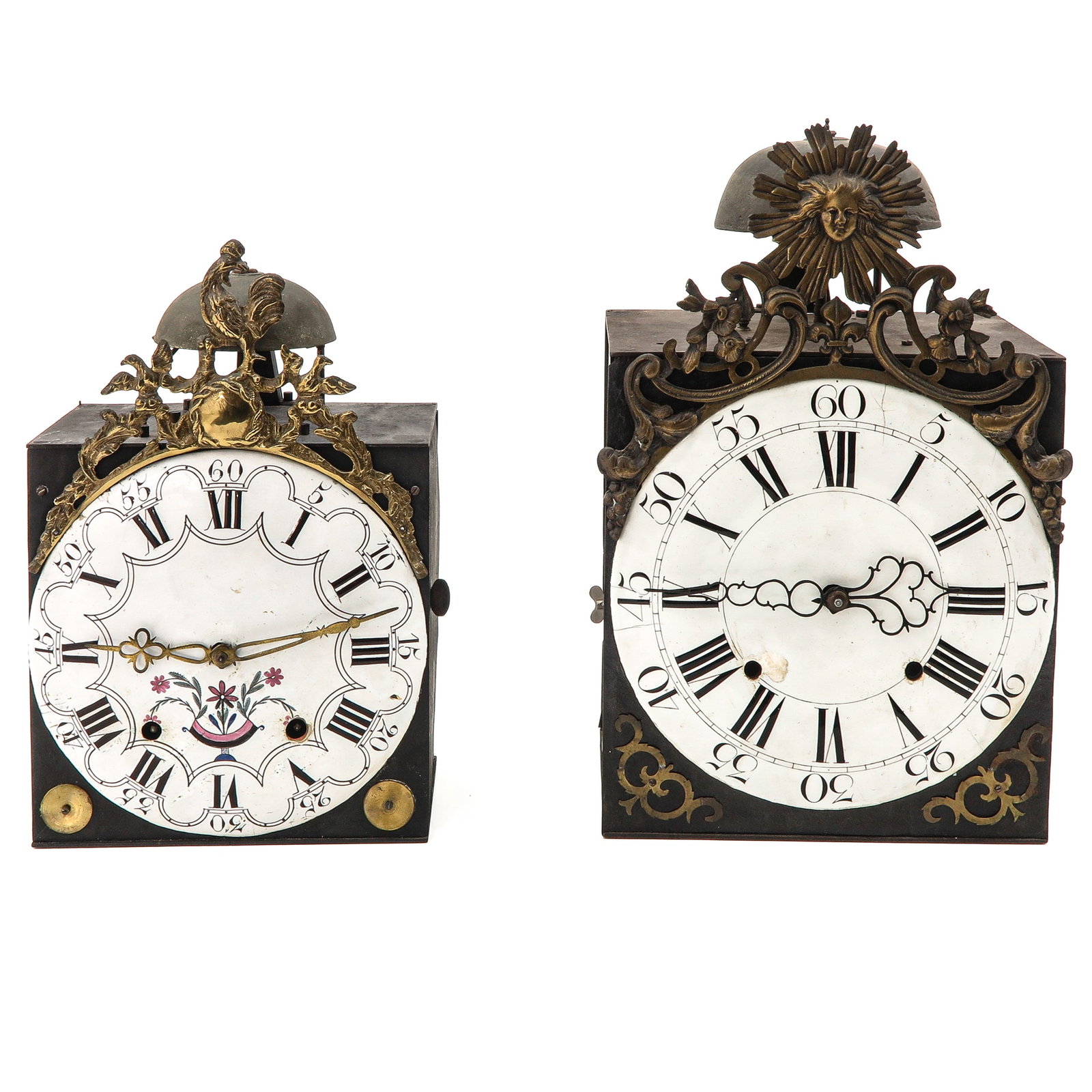 A Lot of 2 Comtoise Clocks: Of two Comtoise clocks, one with a rooster and one with a sun, height 45 cm.