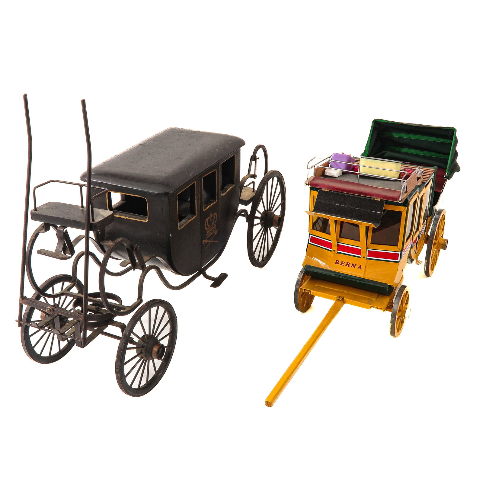 A Lot of 2 Miniature Carriages: of two miniature carriages, including a black royal carriage with crown emblem and a colorful St. Gotthard Express with the inscription "Bernard," height 34 cm.