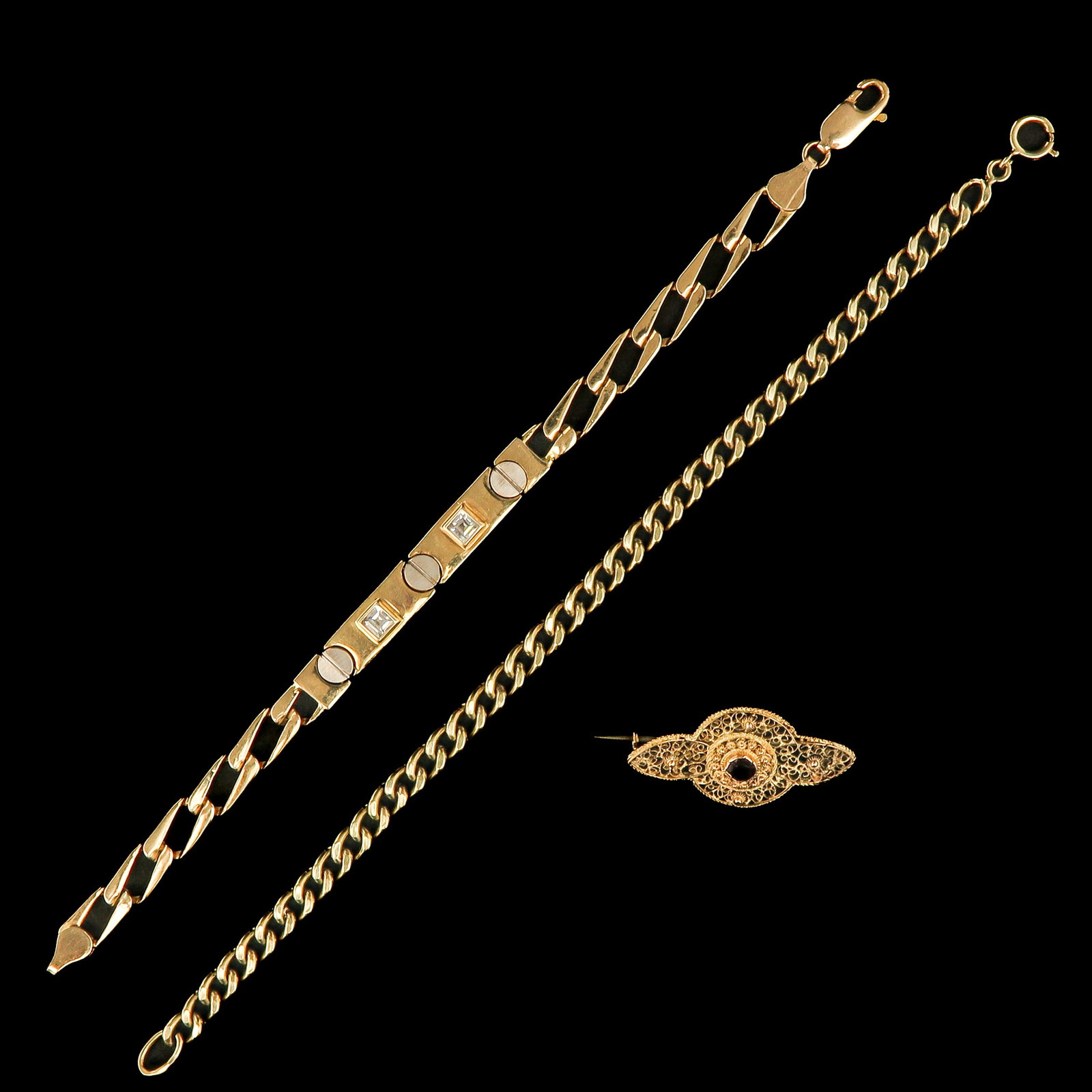 A Group of 14KG Jewelry: Consisting of three pieces of 14-karat gold jewelry, including a link bracelet.