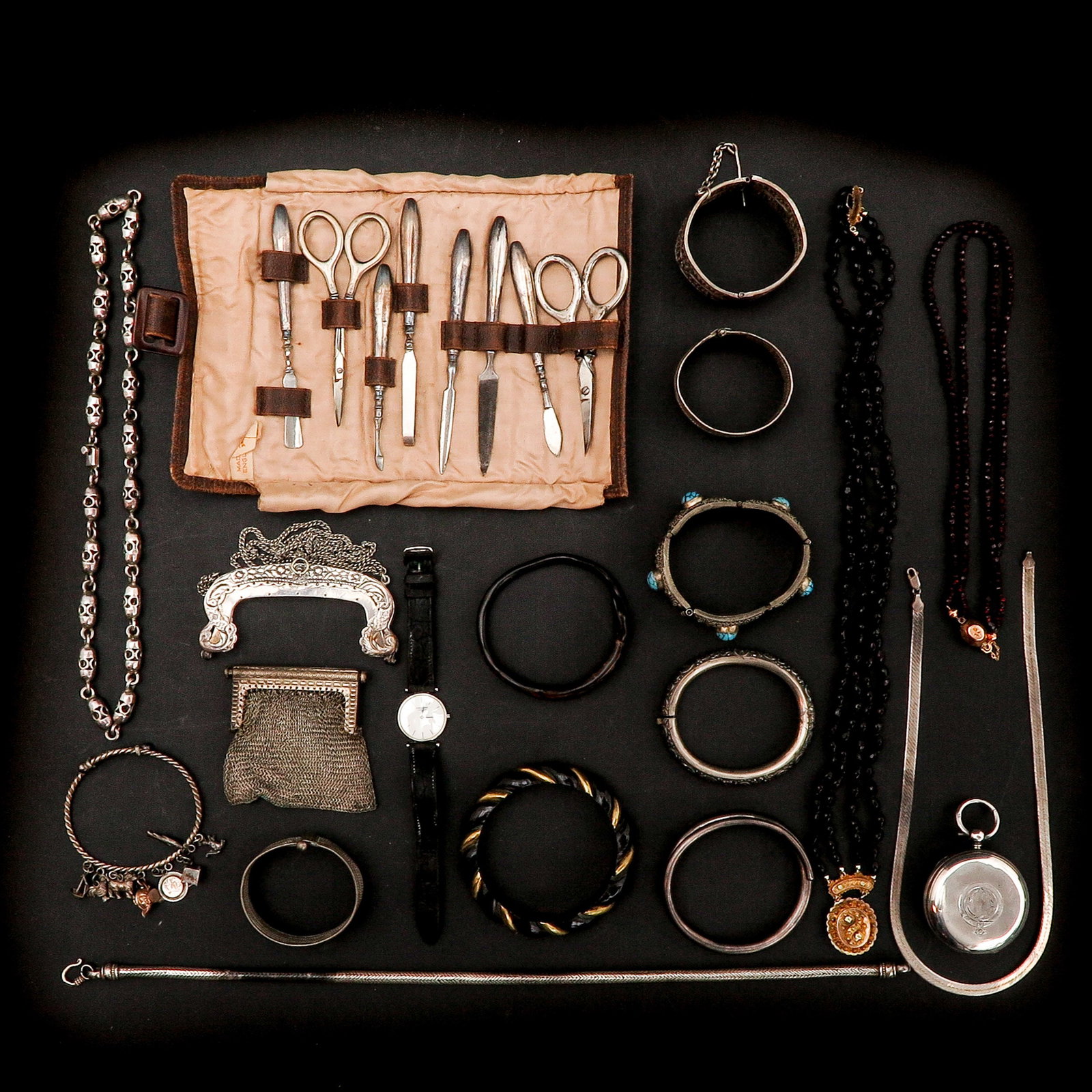 A Group of Jewelry: Various items, including garnet necklaces with 14K gold clasps.