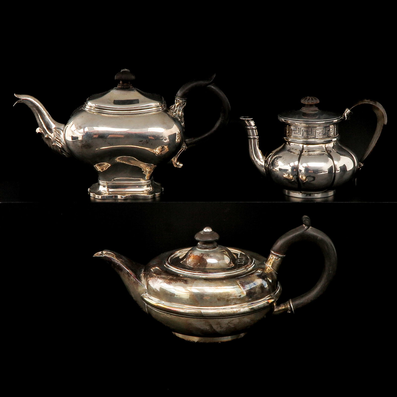 A Group of Silver Tea Pots: Three pieces of second-grade silver teapots, including Bonebakker, highest 12 cm.