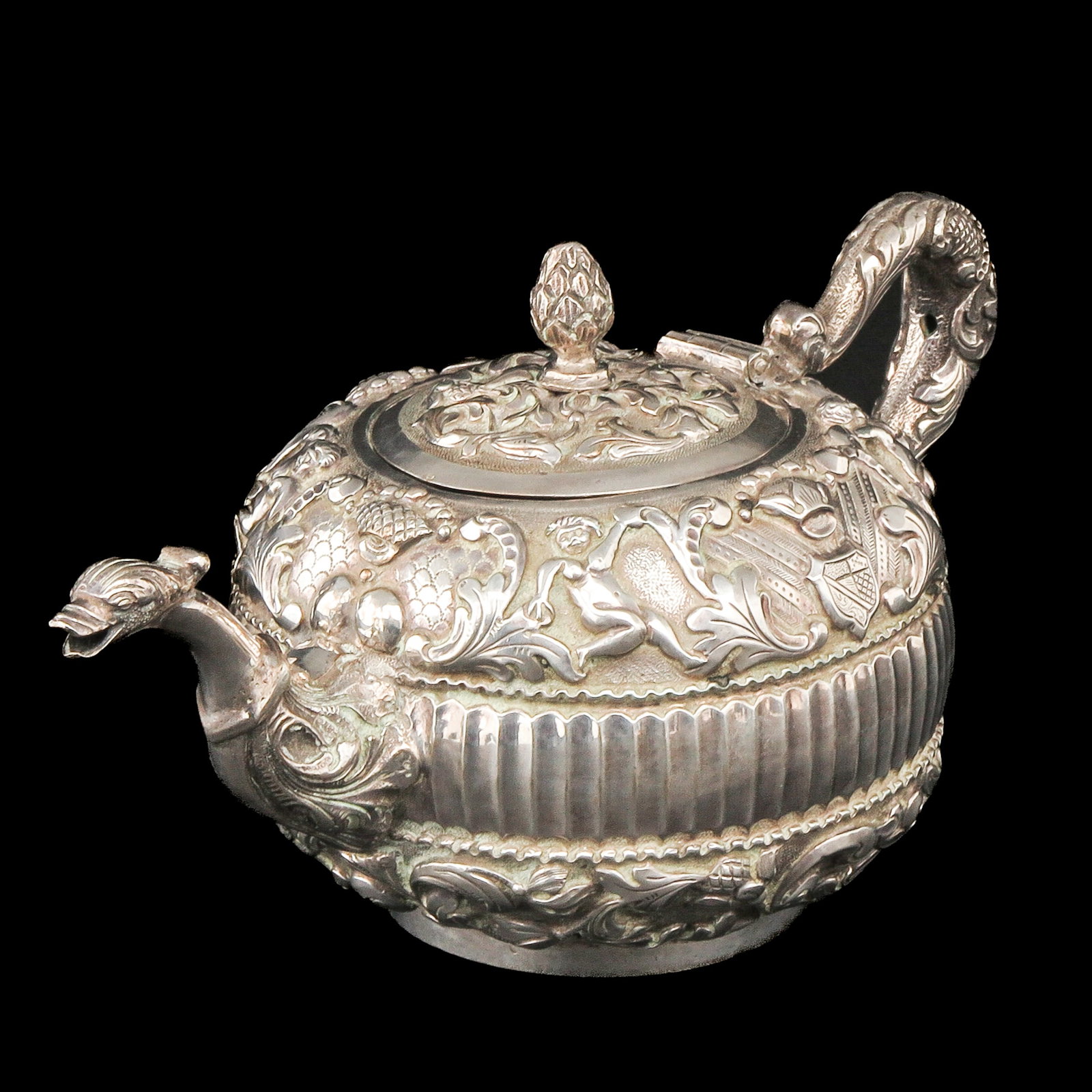 A Silver Teapot: Silver, possibly Rotterdam 1771, height 10 cm.