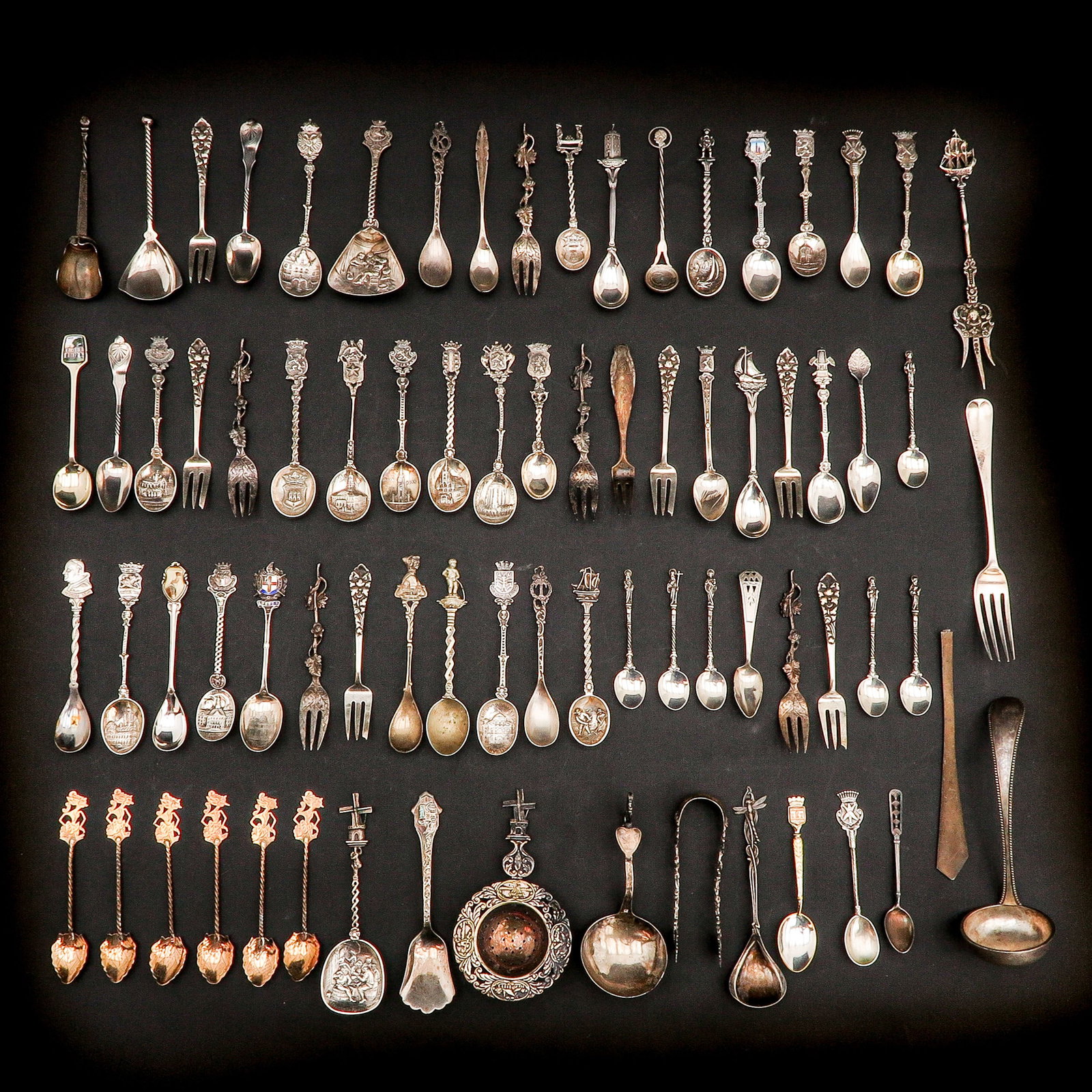 A Diverse Collection of Items: With various scoops, including Dutch silver