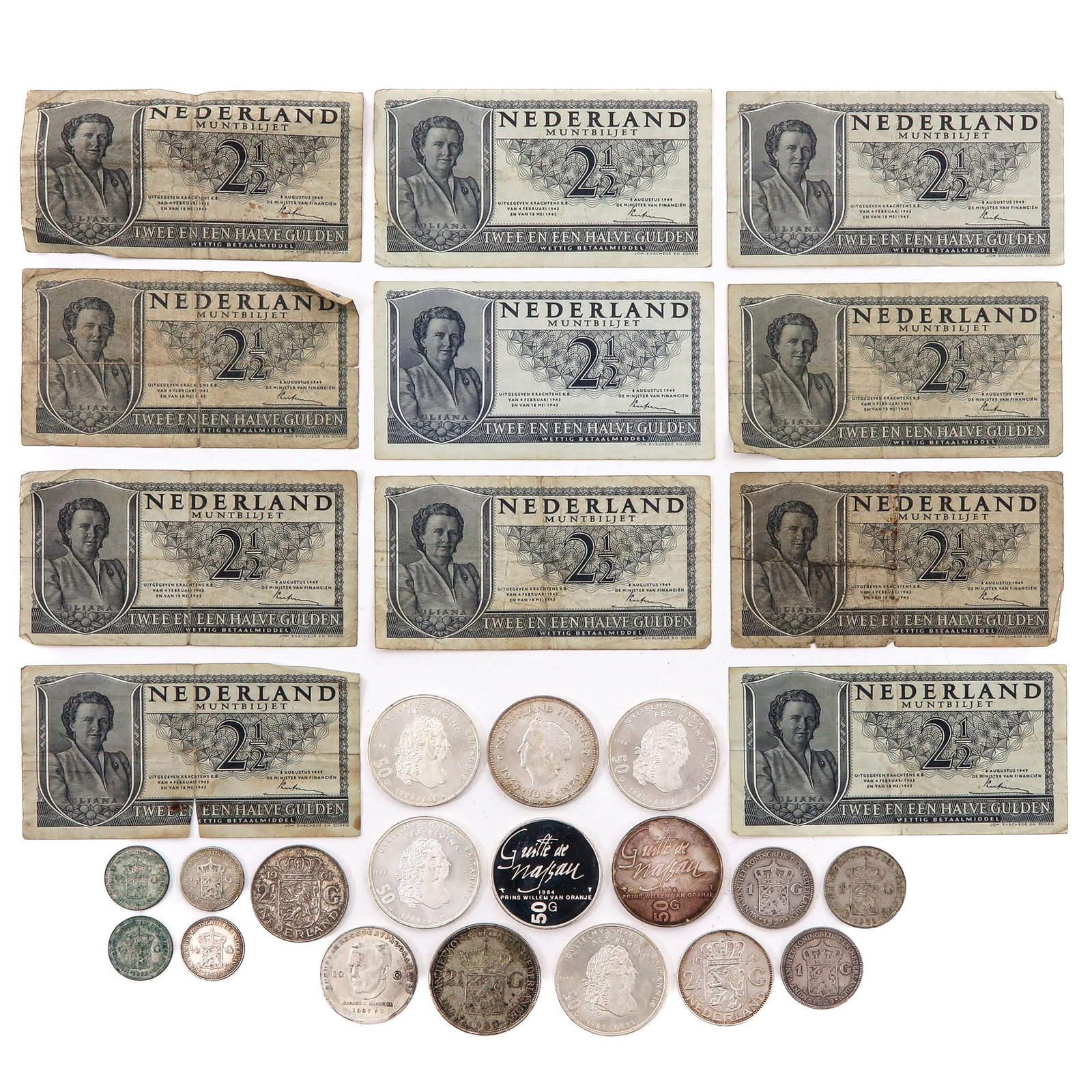 A Collection of Coins and Bank Notes: Including silver coins such as rijksdaalders