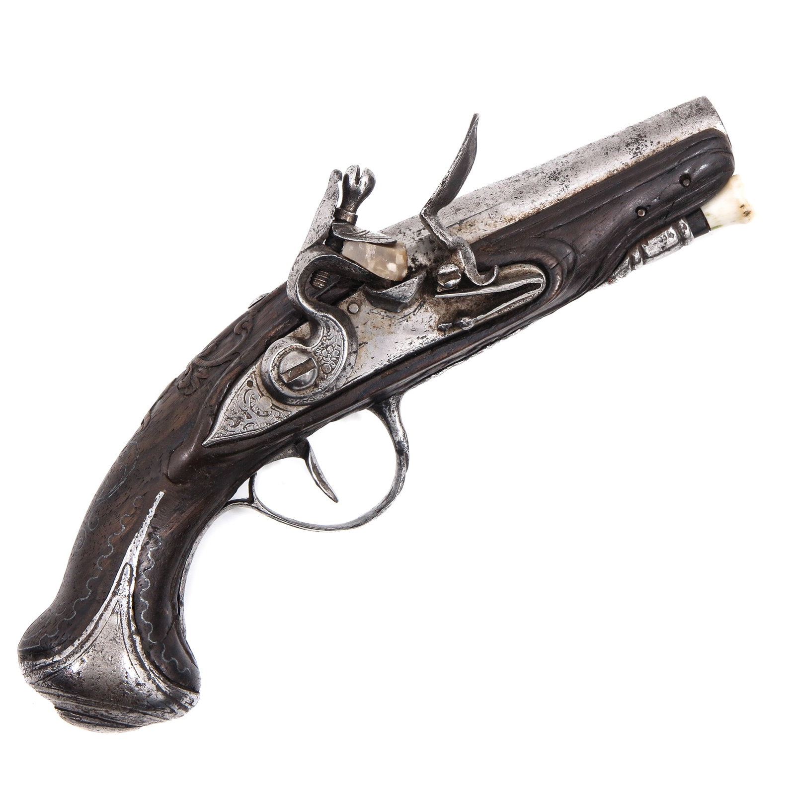 A Small Traveling Pistol: France, circa 1780, length 18 cm. This weapon is exempt under Article 18 of the Dutch War Crimes Act (RWM).