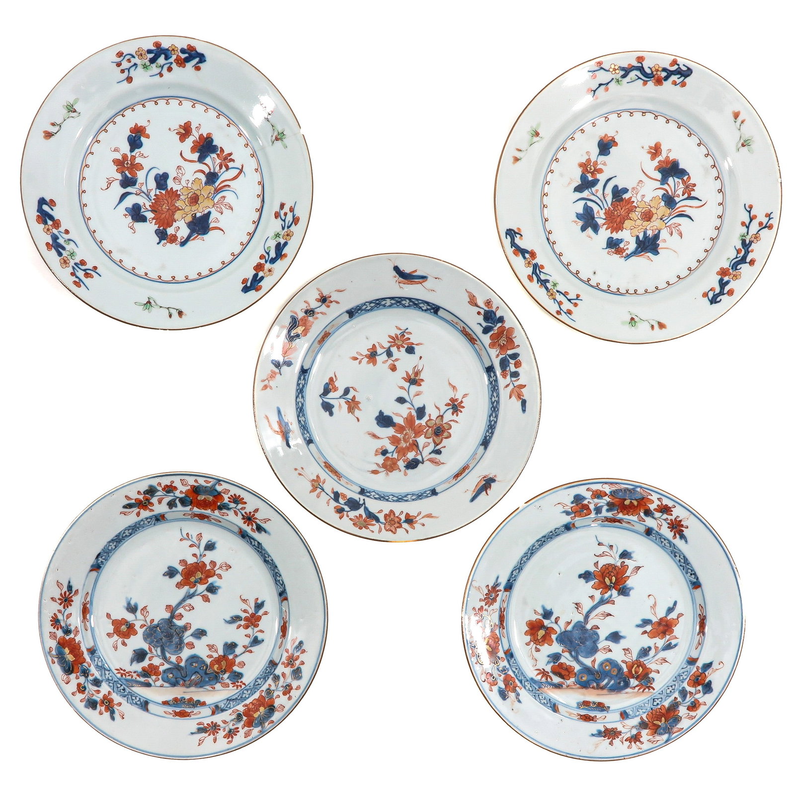A Collection of 5 Imari Plates: Floral decoration in iron-red, blue, and gilt enamels, 23 cm. in diameter, in diverse conditions.