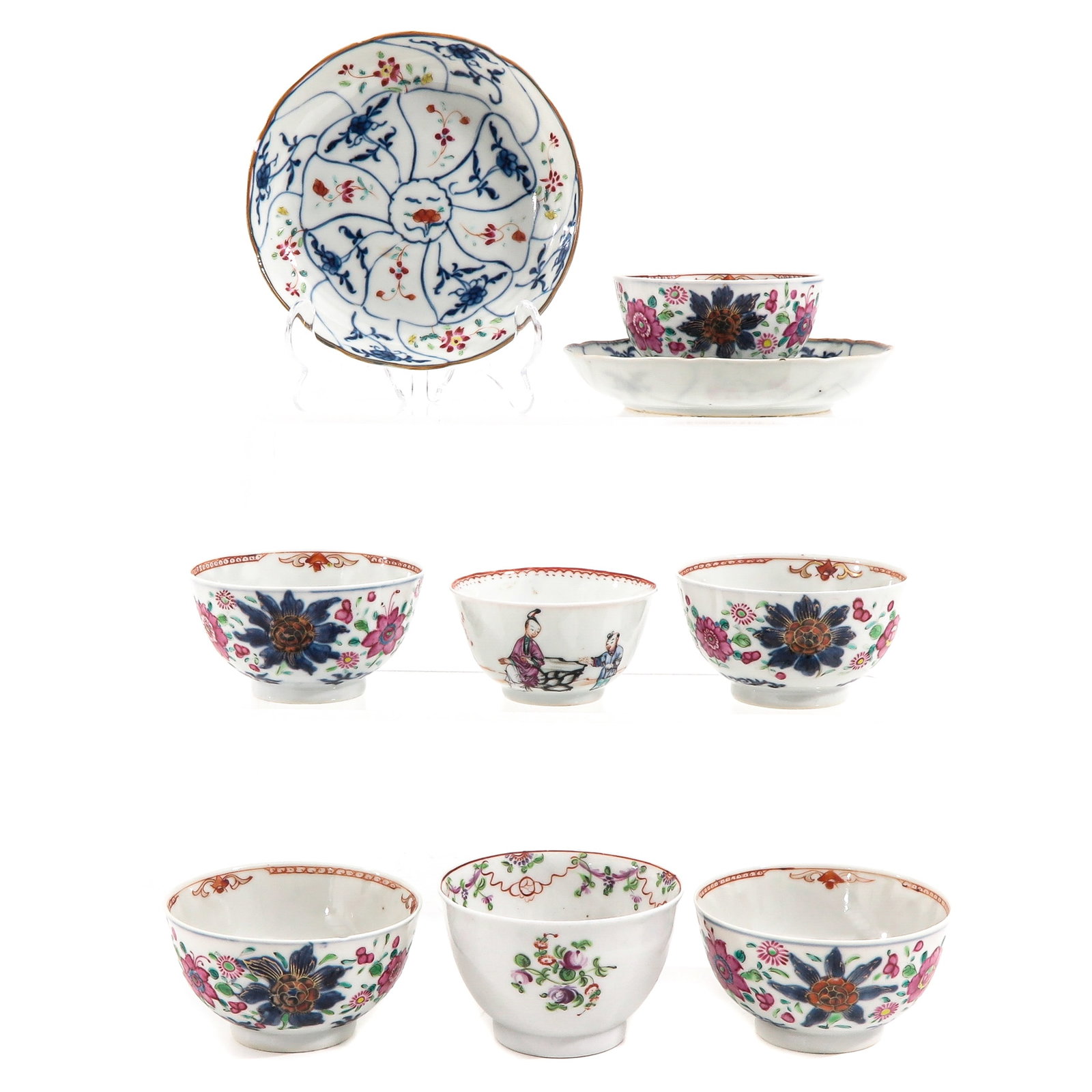 A Collection of Cups and Saucers: 9 pieces, Famille Rose floral decor, saucers are 14 cm. in diameter, chip.