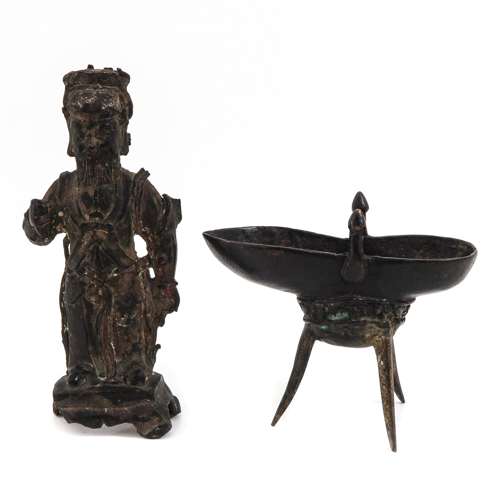 A Chiinese Bronze Jue and Sculpture: Ju wine vessel measures 13 cm. tall, sculpture of man is 20 cm. tall.