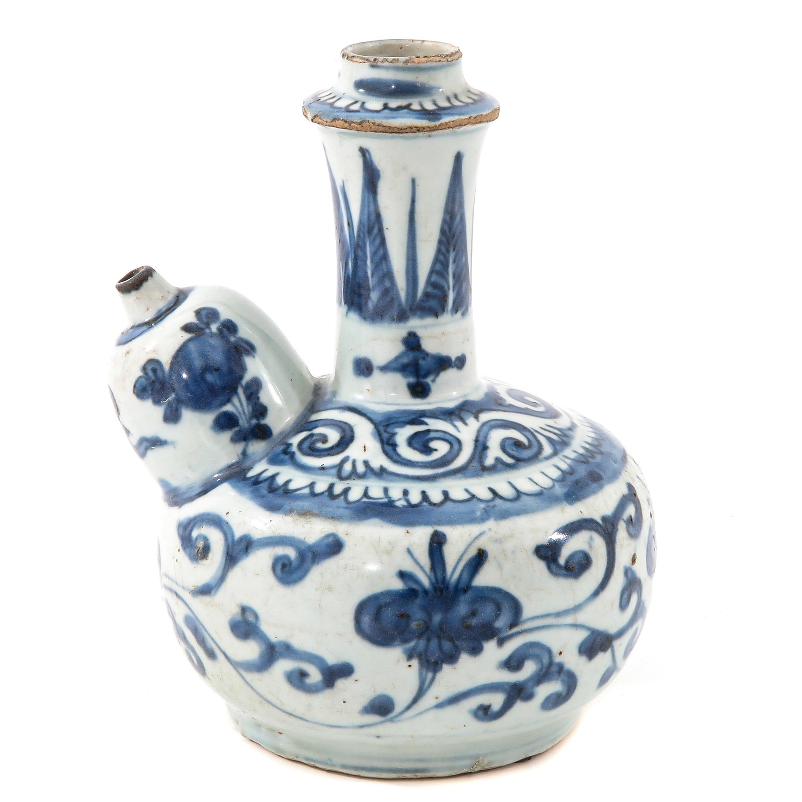 A Blue and White Kendi: Floral decor, Ming period, 18 cm. tall.