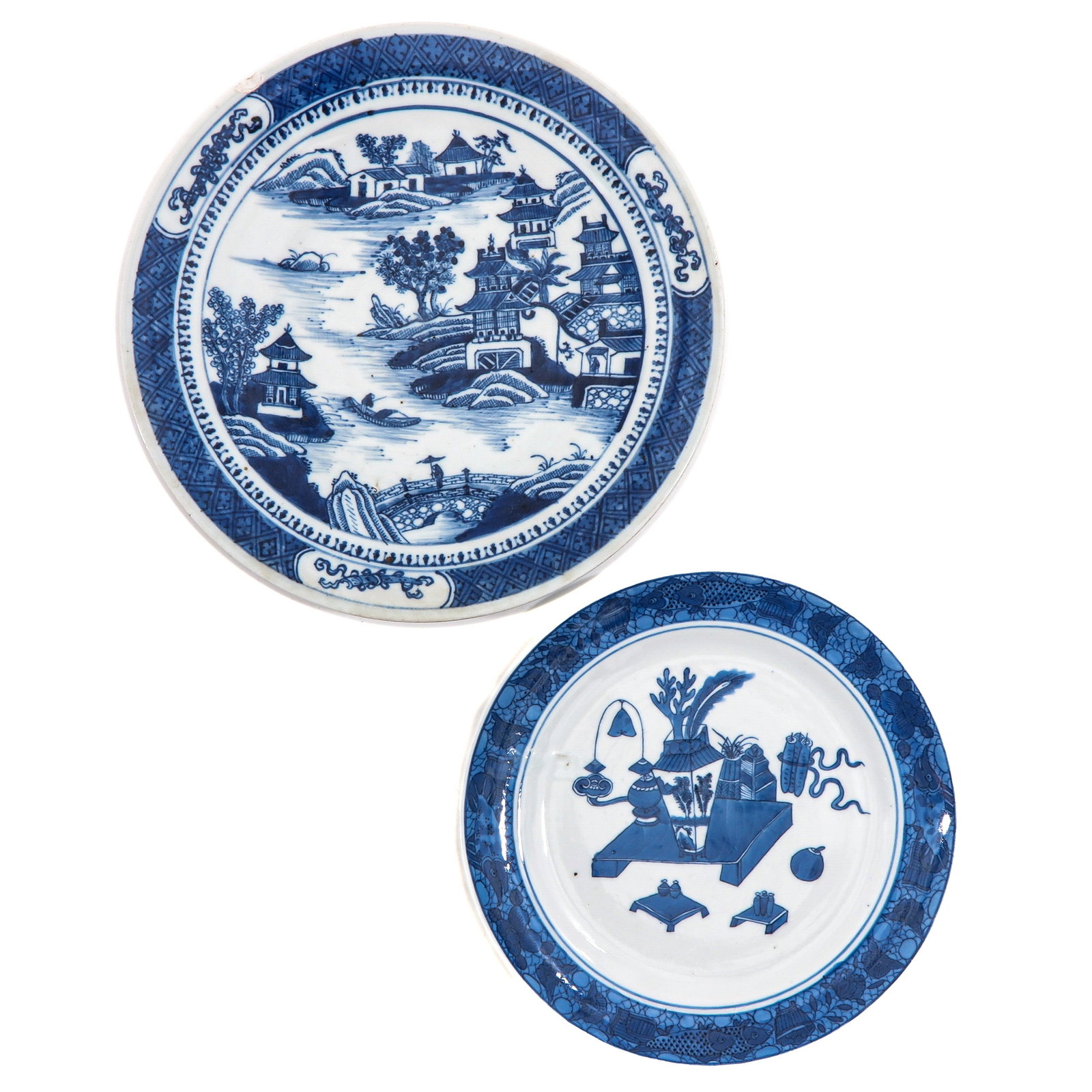 A Lot of 2 Blue and White Plates: Including decors of landscape and Chinese antiquities, largest plate is 27 cm. in diameter, chip.