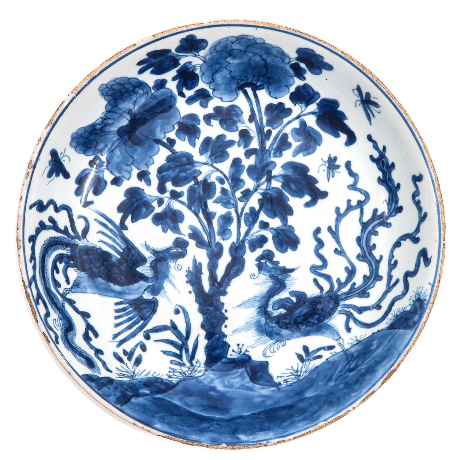 A Blue and White Dish: Depicting a scene in a graden with Phoenix, 28 cm. in diameter, chip and hairline.