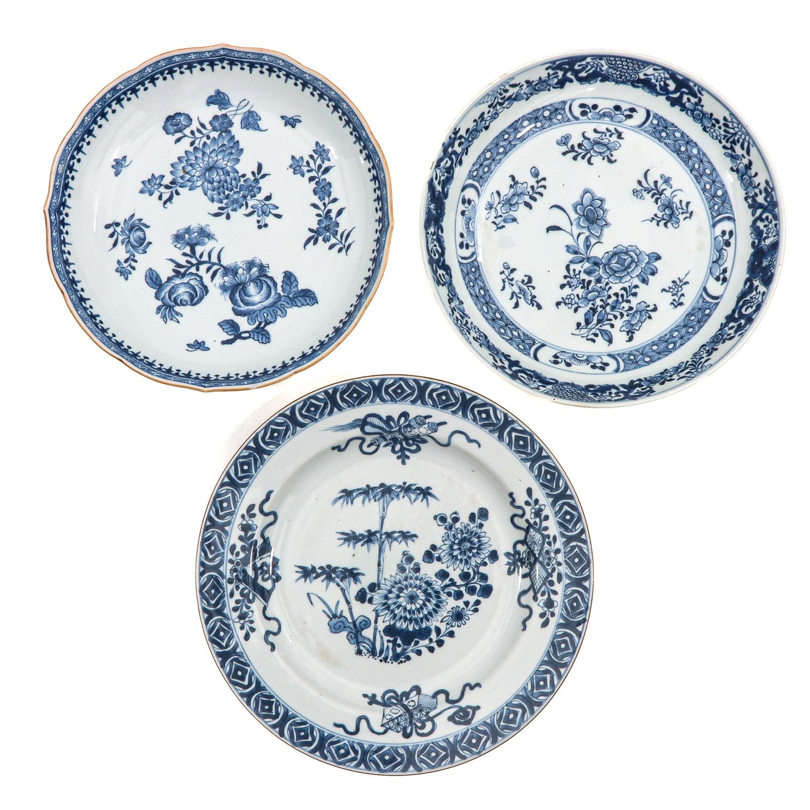 A Group of 3 Blue and White Plates: In a variety of floral decors, including Qianlong Period, largest plate is 28 cm. in diameter.