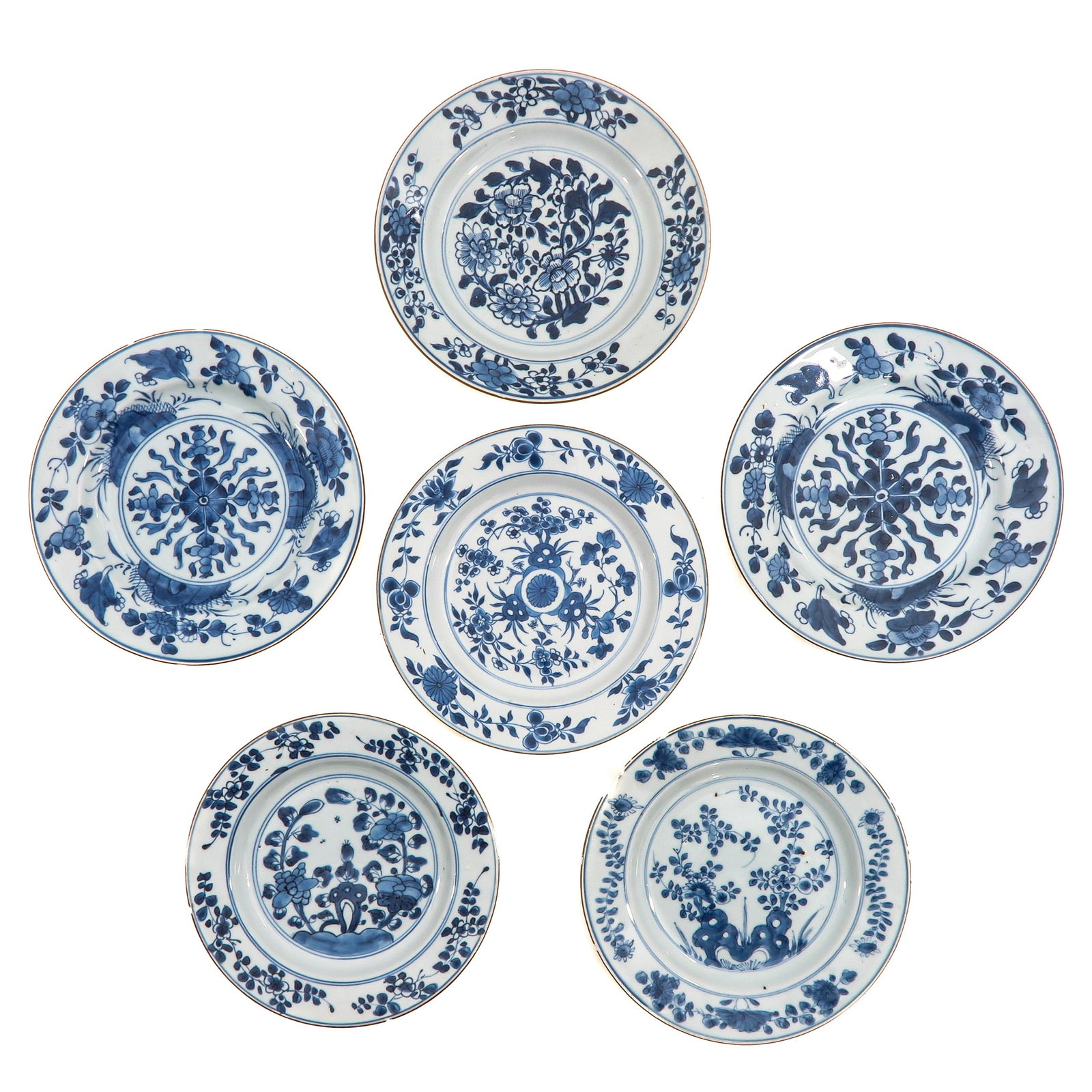 A Group of 6 Blue and White Plates: Depicting scenes in a garden, 18th Century, 23 cm. in diameter, chip and hairline.