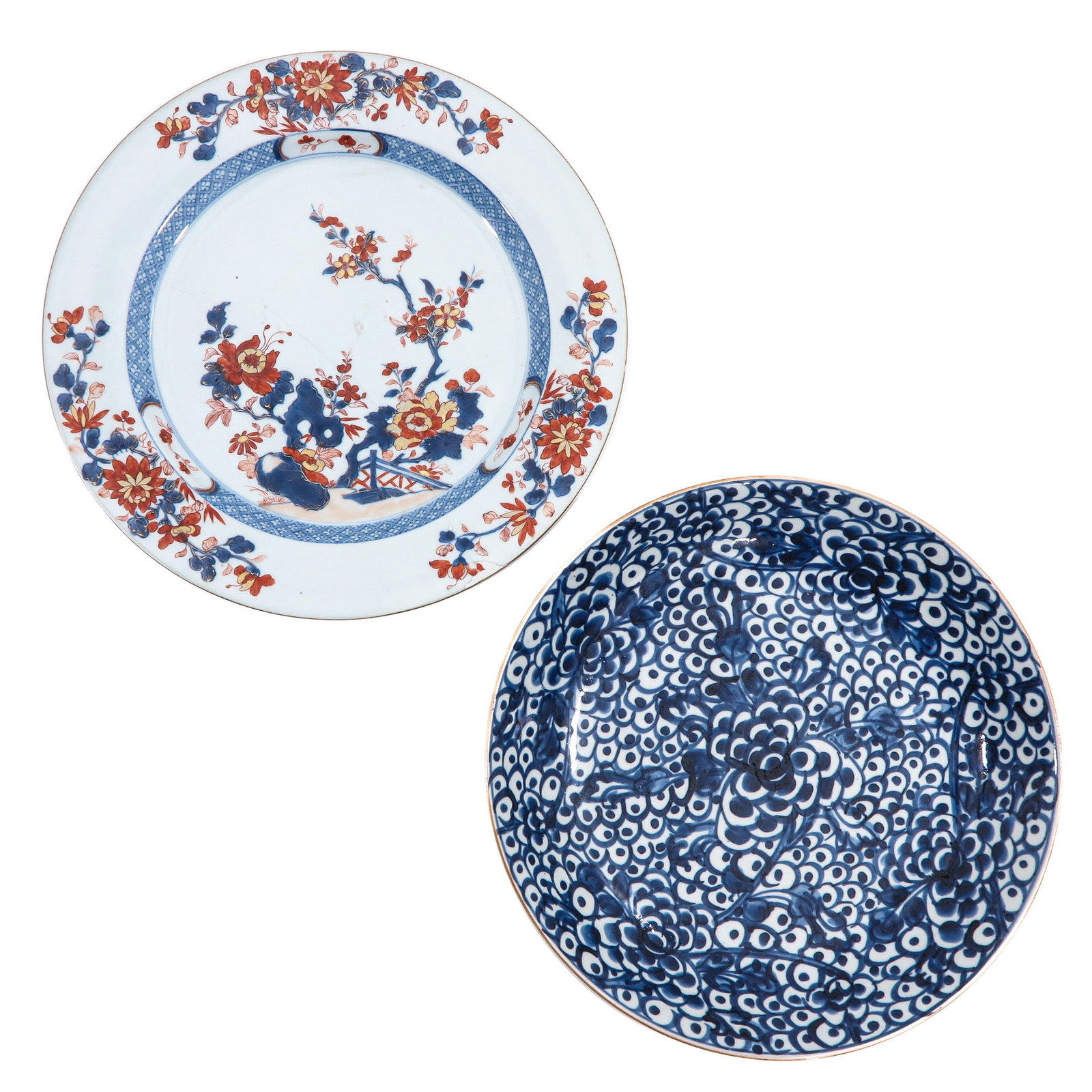 A Lot of 2 Chargers: Including blue and white and Imari decors, 18th Century, largest charger is 36 cm. in diameter, chip and hairline.