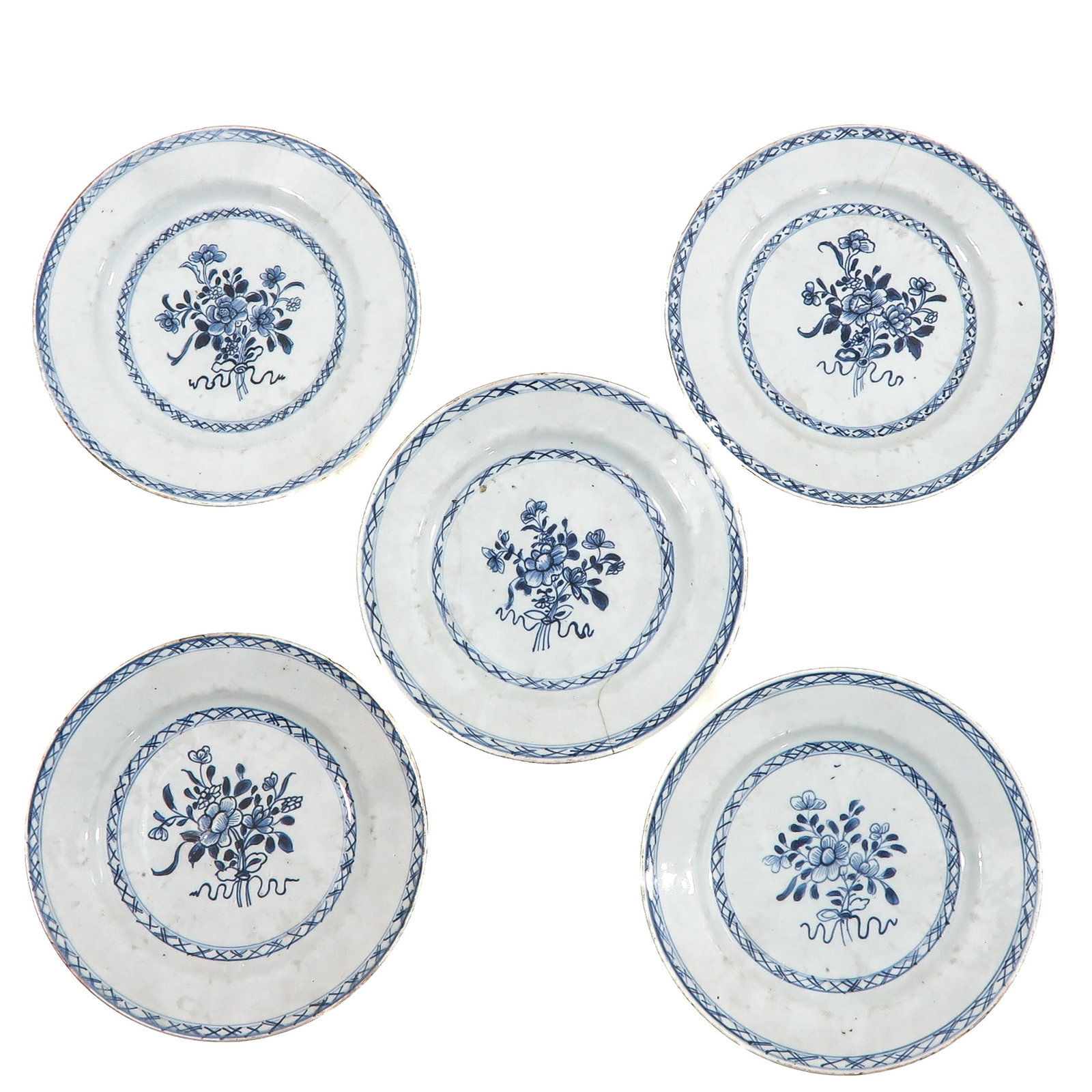 A Series of 5 Blue and White Plates: Floral decor, 18th Century, 23 cm. in diameter, chip and hairline.