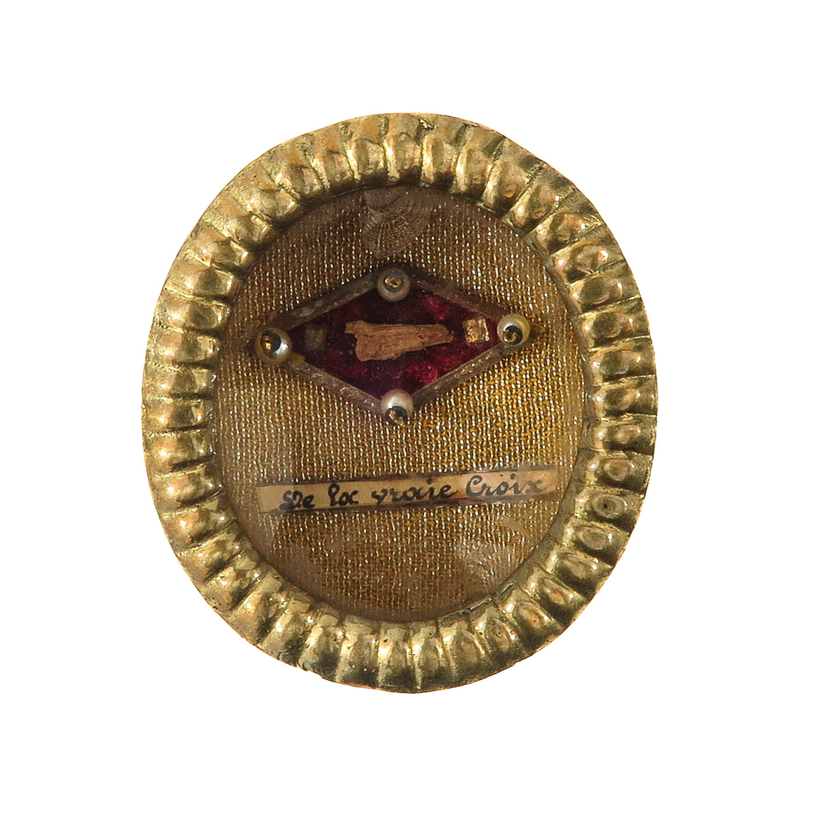 A Sealed Theca: Including a relic of the Holy Cross, length 6.5 cm. You are purchasing the theca. The relics are a gift.