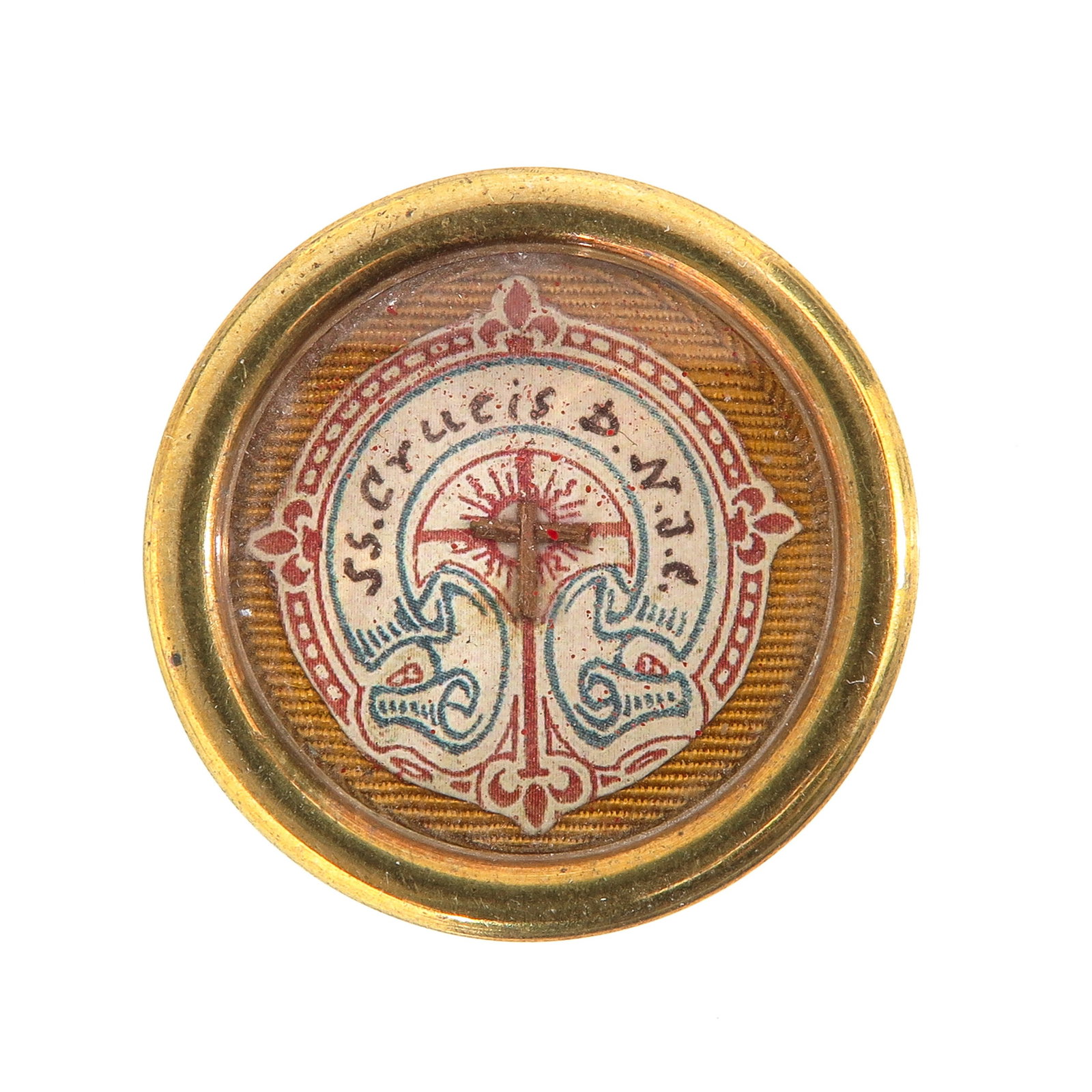 A Sealed Theca: Containing a relic of the Holy Cross, S.S. Crucis D.N.J.C., diameter 4 cm. You are purchasing the theca; the relics are a gift.