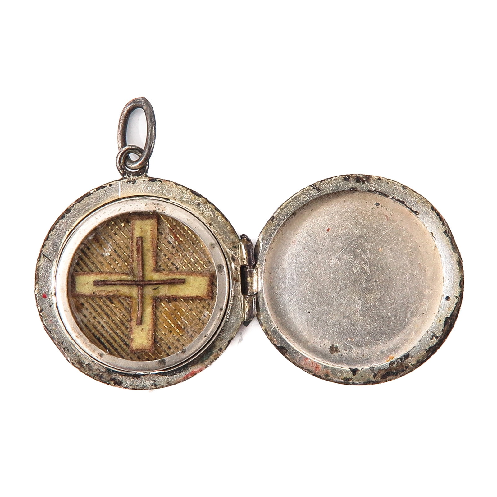 A Sealed Reliquary: Containing a relic of the Holy Cross, length 3 cm, you are buying the theca, the relics are a gift.