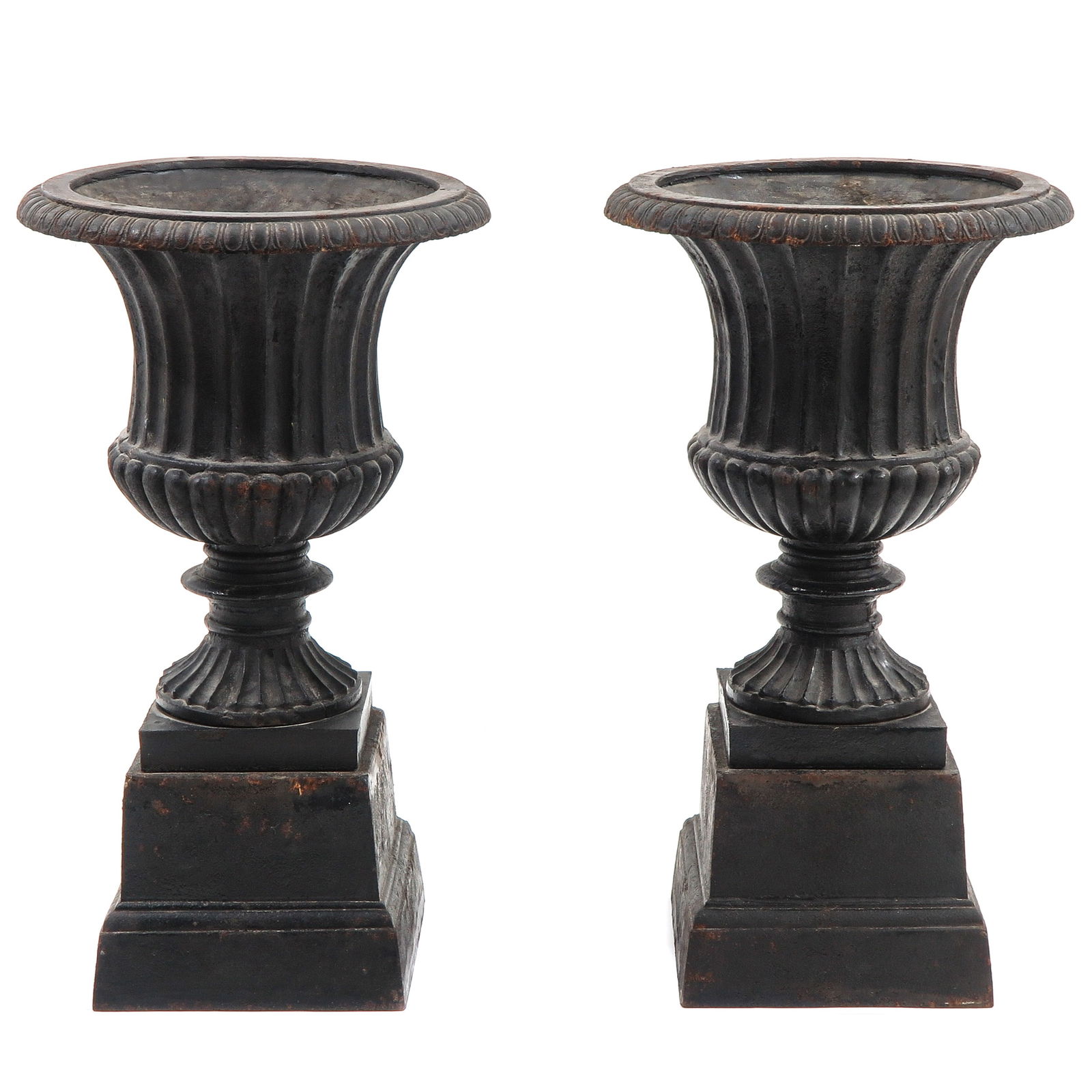 A Pair of Cast Iron Garden Vases: Cast iron planters, height 53 cm.