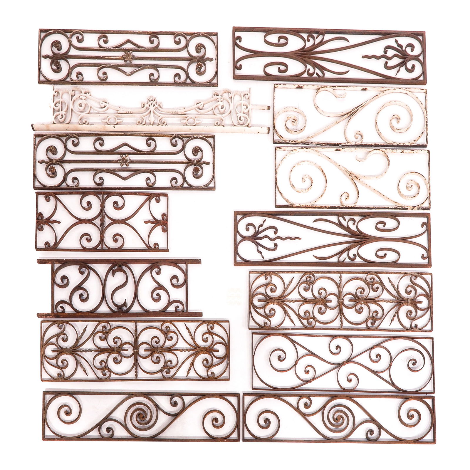 A Group of Wrought iron Garden Ornaments: Consisting of wrought iron railings, longest 132 cm.