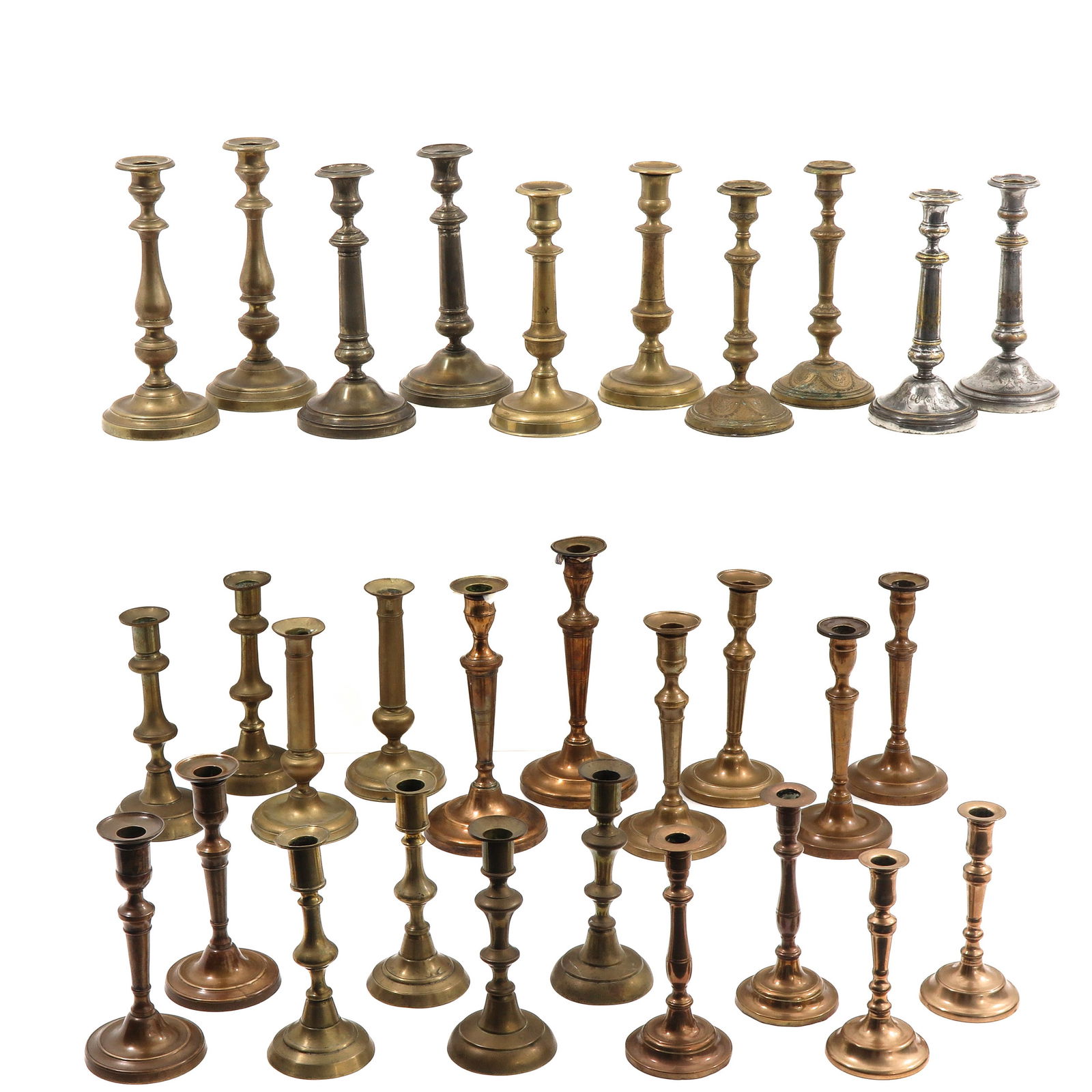 A Group of 30 19th Century Candlesticks: Consisting of thirty candlesticks in various sizes and styles, 19th century, height 28 cm.