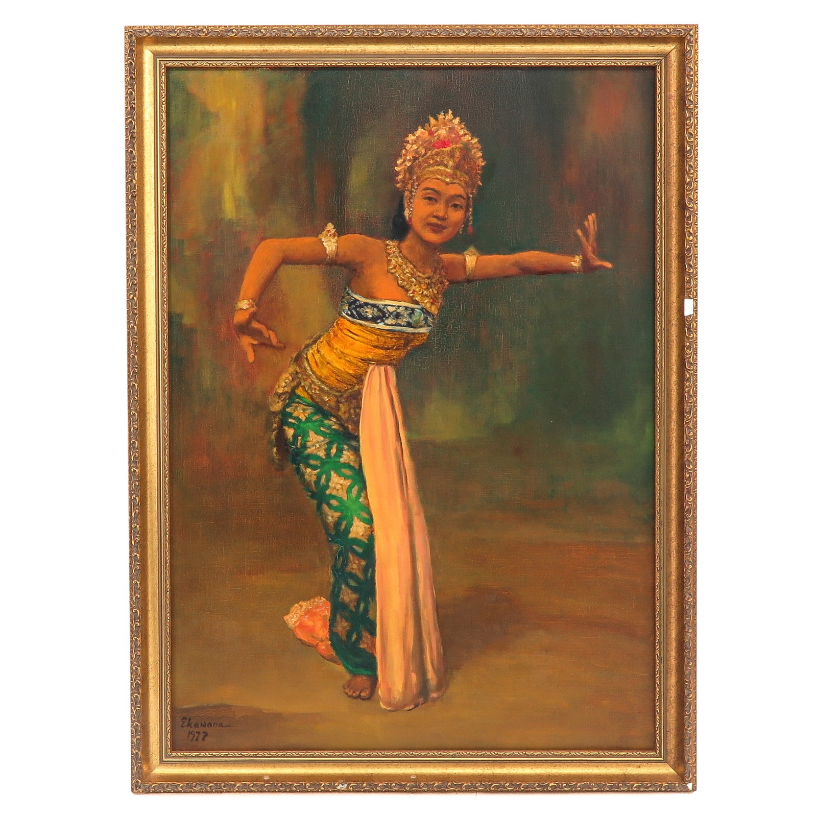 An Oil on Canvas Painting: Oil on canvas, depicting a Balinese dancer in traditional costume, signed Ekawana, dated 1977, in a gilded frame, 50 x 70 cm.