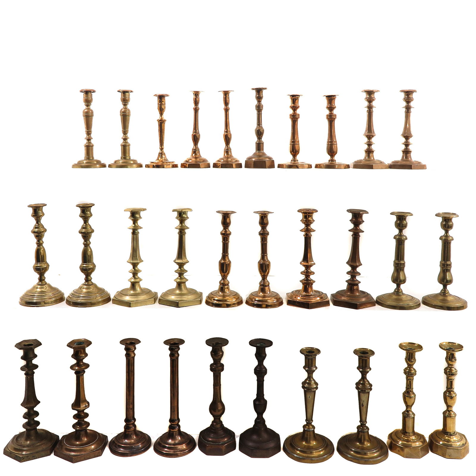 A Group of 30 19th Century Candlesticks: Consisting of thirty candlesticks in various sizes and styles, 19th century, tallest 28 cm.