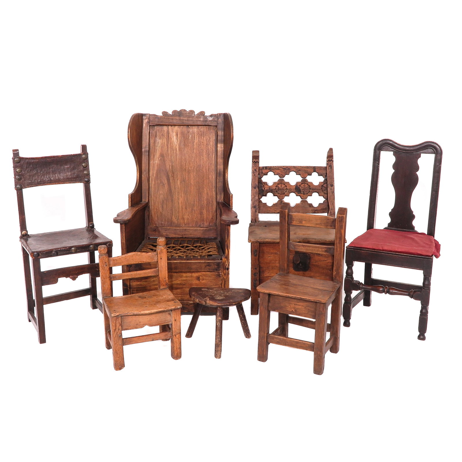 A Collection of Chairs: Consisting of 7 chairs, including an oak wing chair, height 109 cm.