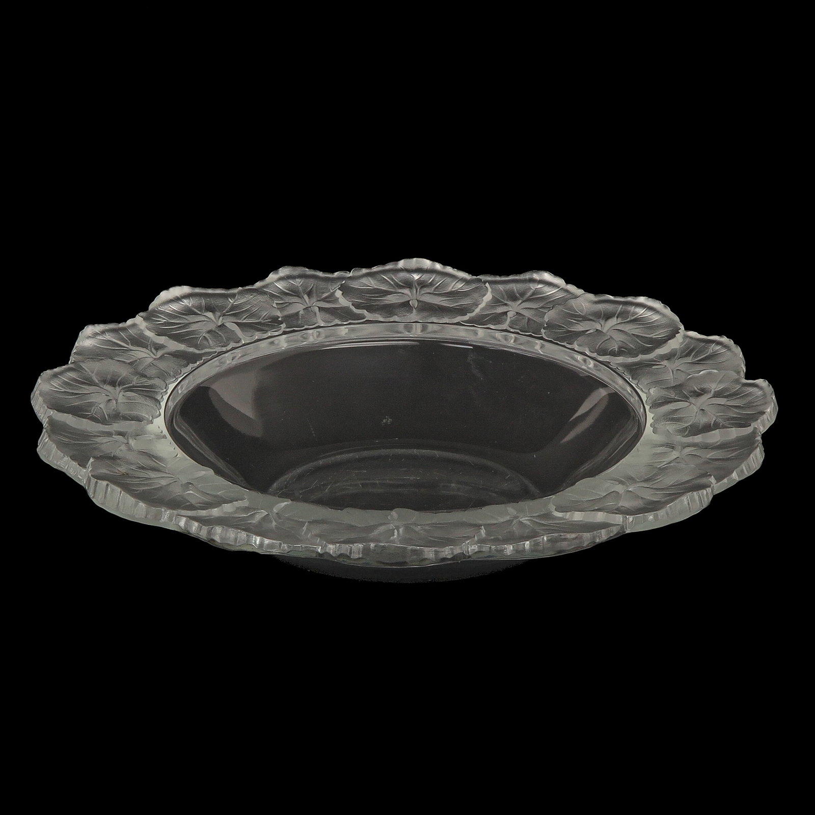 A Lalique Glass Plate: Glass, signed Lalique France, model Honfleur, diameter 28 cm.