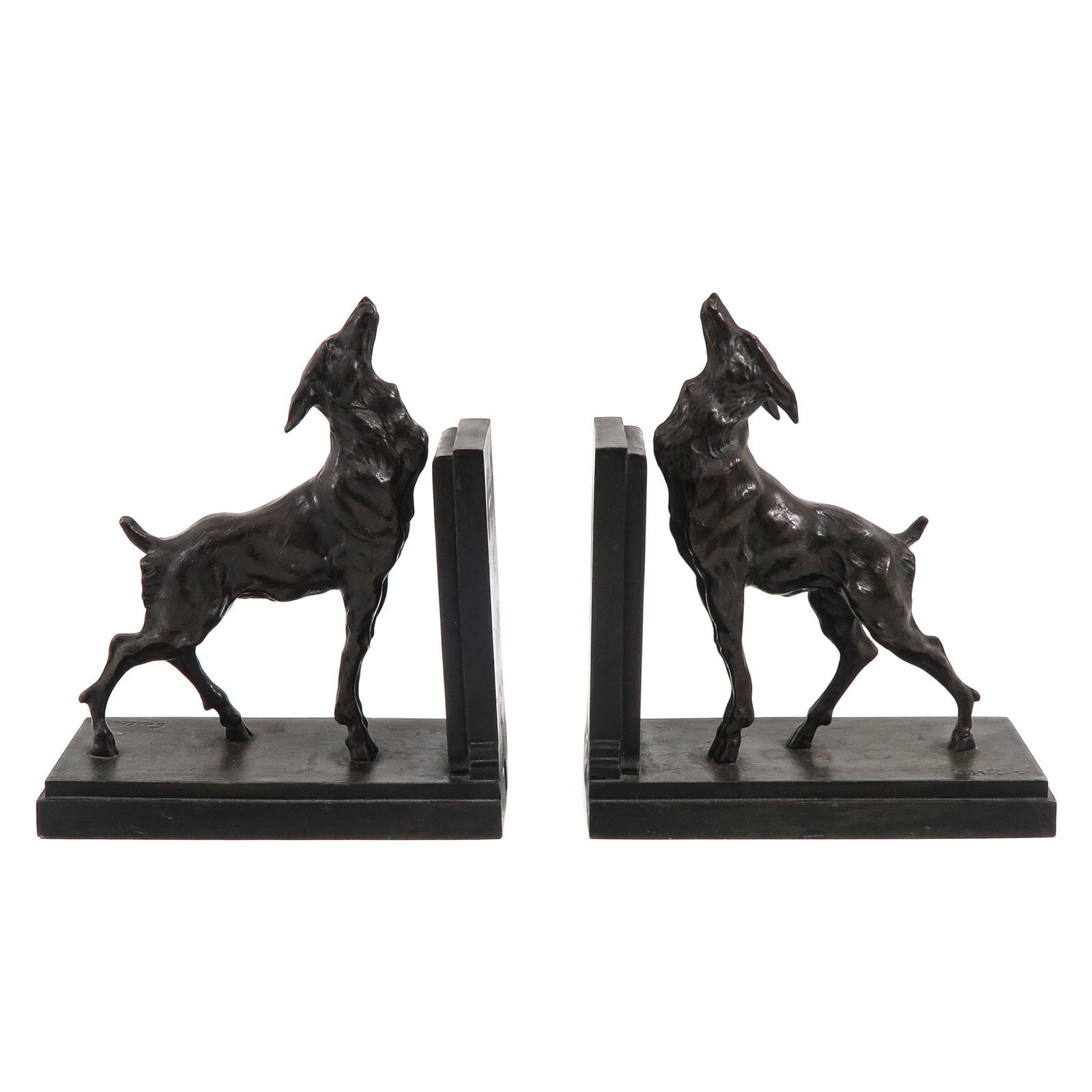 A pair of Bookends Signed Carlier: Bookends, signed Carlier, each 21 x 24 x 10 cm.