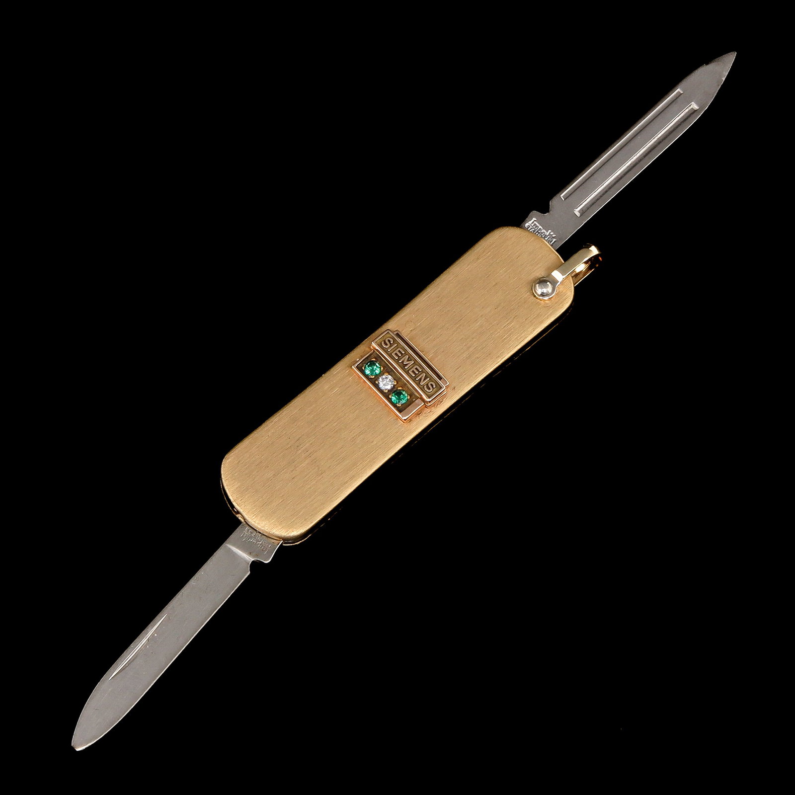 A Pocket Knife: Issued as a promotional gift by Siemens, length 6 cm.