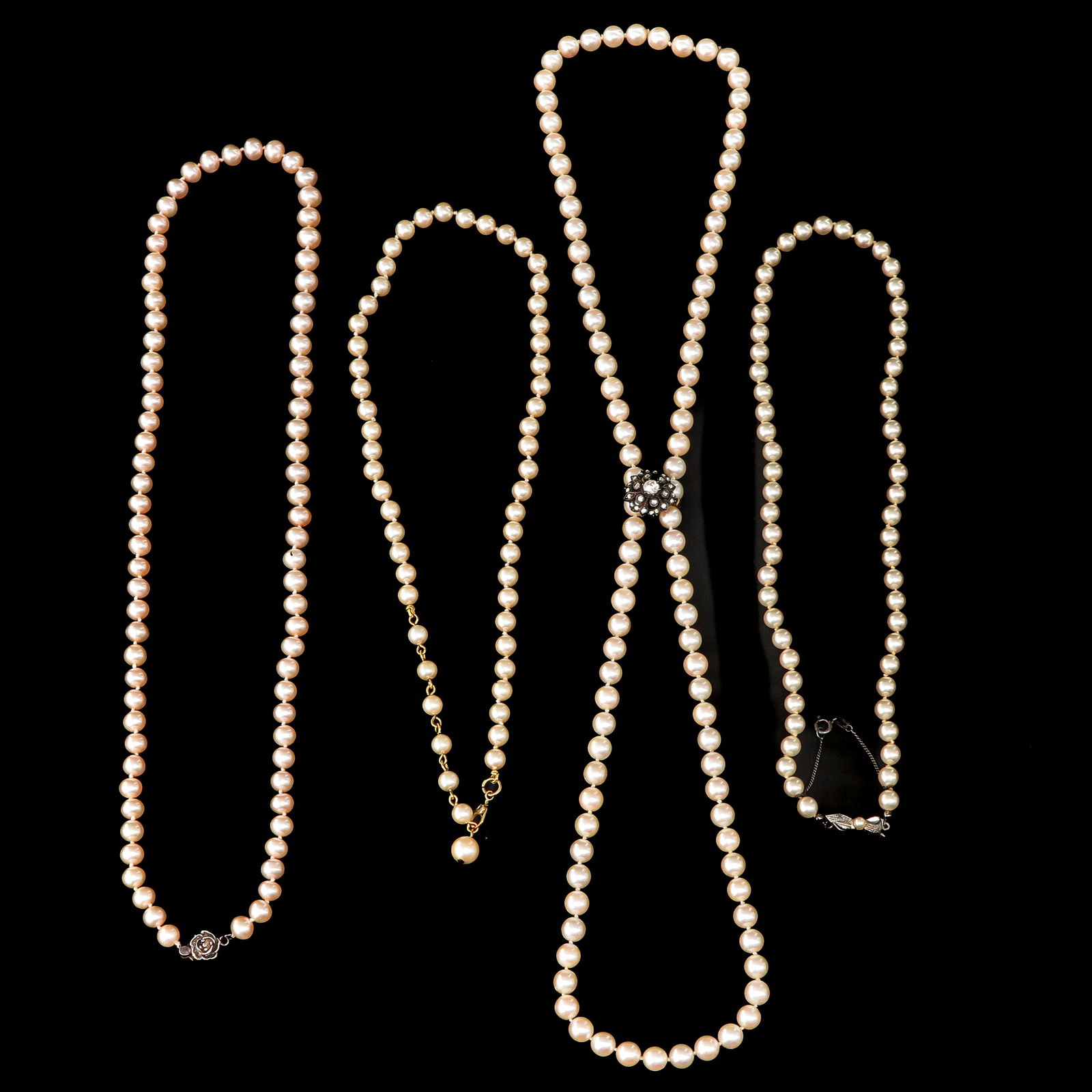 A Group of 4 Pearl Necklaces (1 of 10)