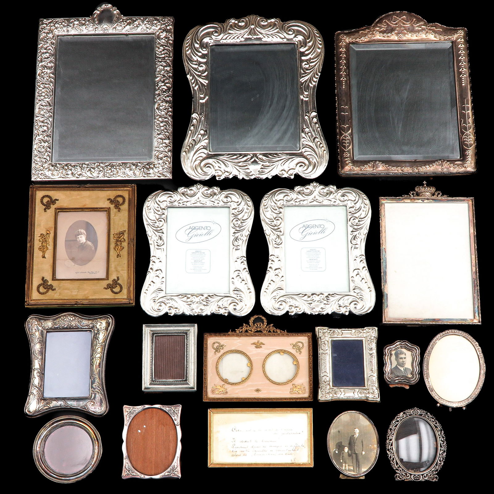 A Diverse Collection of Items: Consisting of picture frames and mirrors, in various sizes and shapes, including silver, height 39 cm.