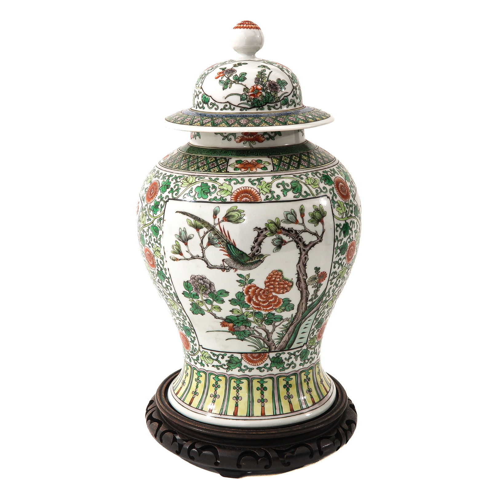 A Famille Verte Jar with Cover: Floral ground with cartouches of flowers and birds, 19th Century, 42 cm. tall.