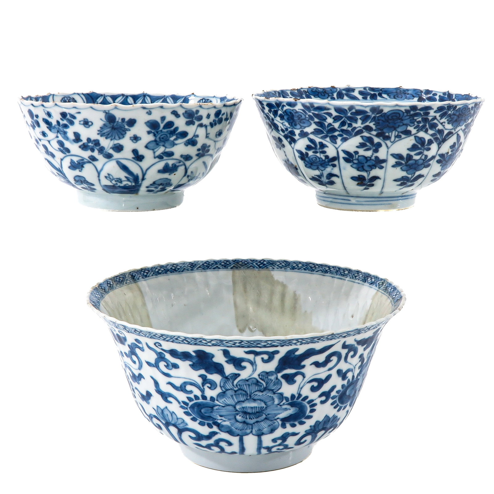 A Group of 3 Blue and White Bowls: In floral decors, including 18th Century, largest bowl is 20 cm. in diameter, in diverse conditions.
