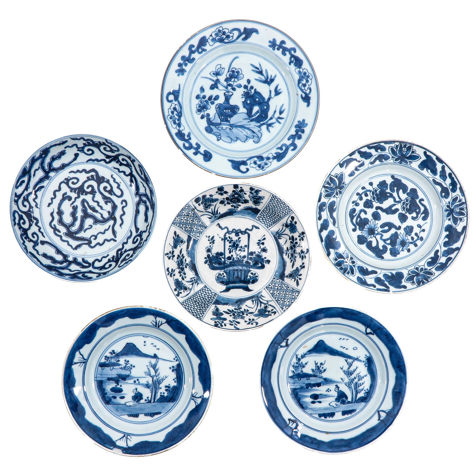 A Group of 6 Blue and White Plates: In a variety of decors and sizes, including 18th Century, largest plate is 23 cm. in diameter, in diverse conditions.